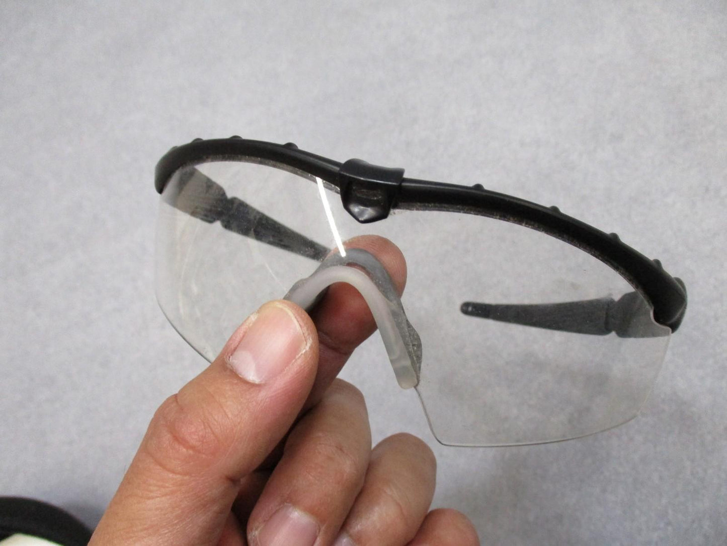 Military Oakley SI M Frame 2.0 shooting safety glasses with case and three lenses, designed for tactical and shooting use.