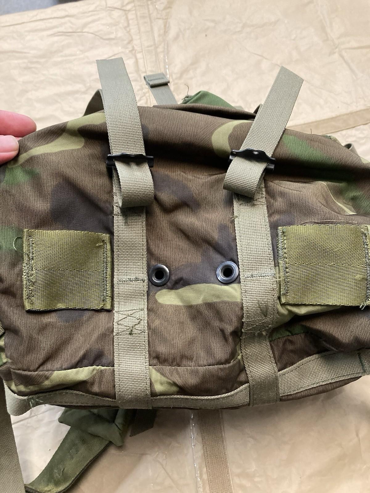 Centex Military Gear Alice Pack radio carrying case attached to M81 Woodland assault pack for military communication equipment.