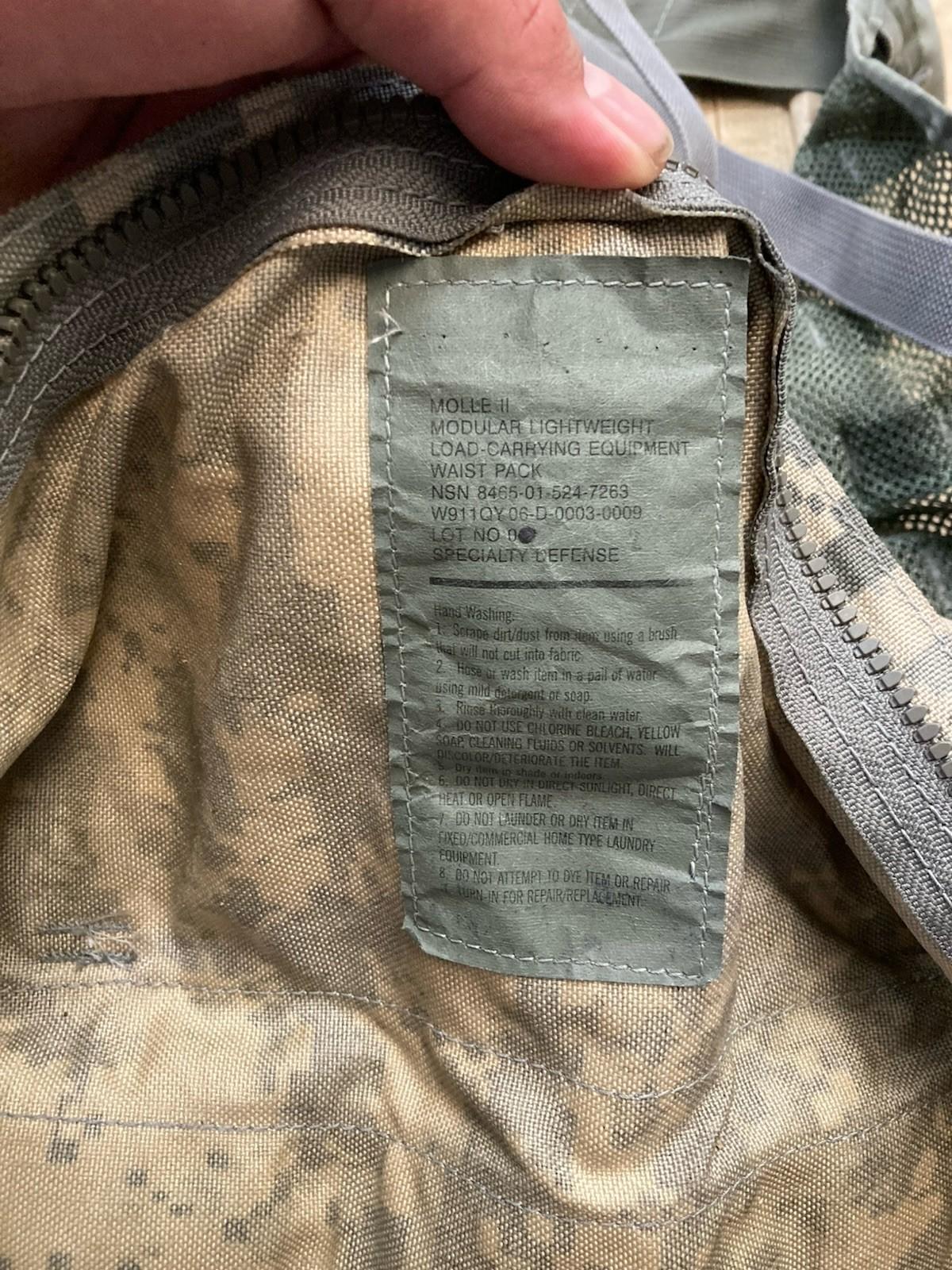 Army issue FLC vest in ACU camo with MOLLE gear setup, tactical military vest by Centex Military Gear.