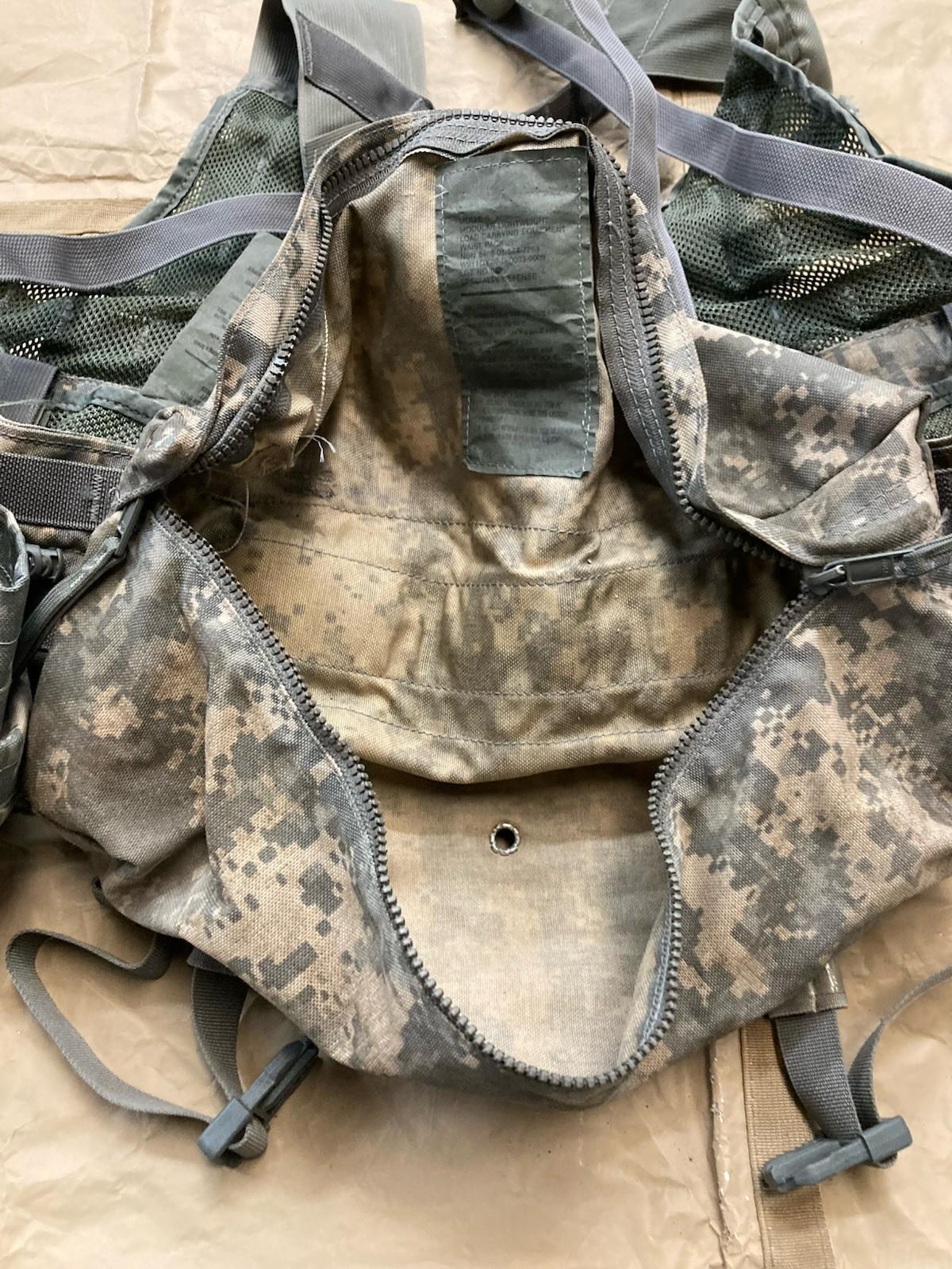 Army issue FLC vest in Acu camouflage with tactical MOLLE gear set, provided by Centex Military Gear, featuring multiple pouches and straps.