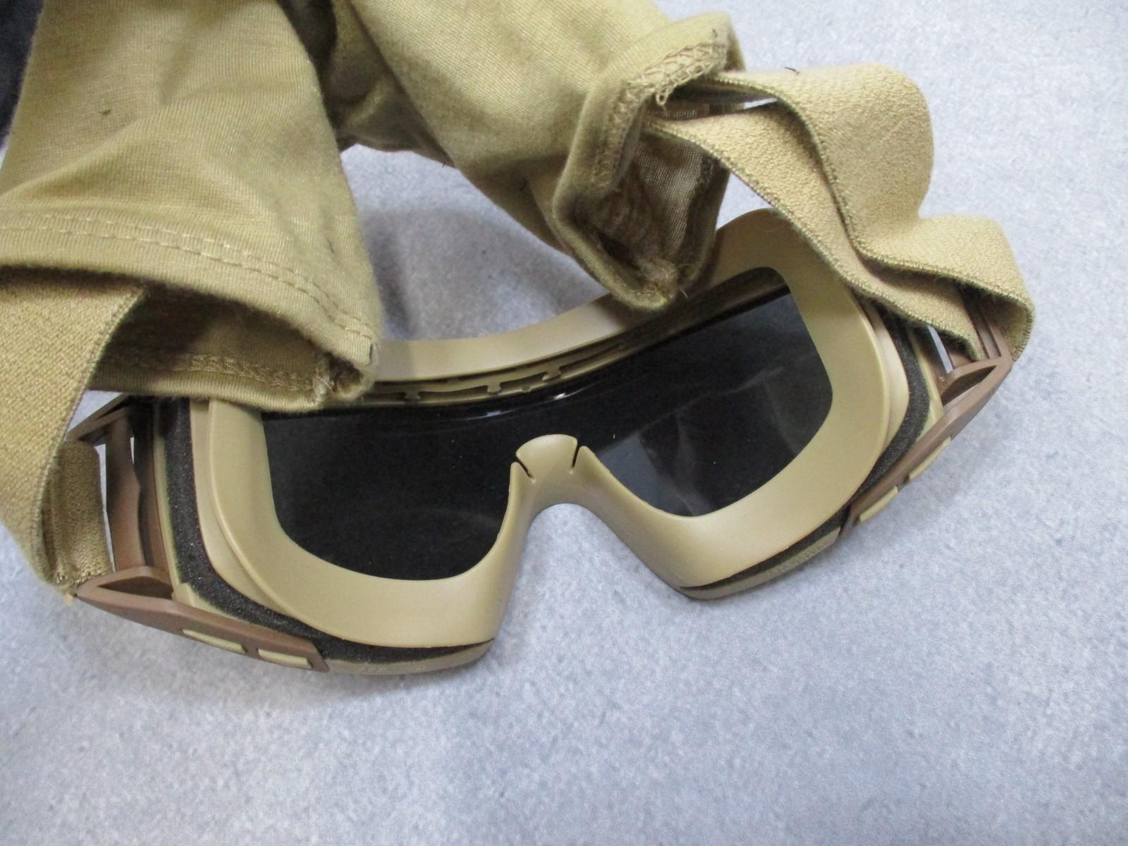 Revision Military Desert Locust goggles with clear lens and pouch, used but in excellent condition, designed for military protection.