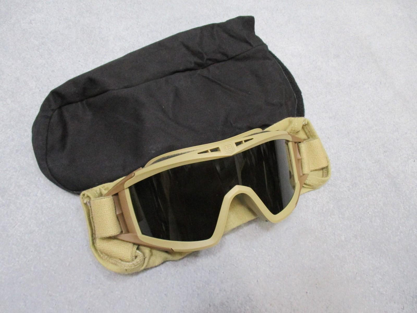 Revision Military Desert Locust goggles with clear lenses and pouch, used but in excellent condition, designed for military protection.