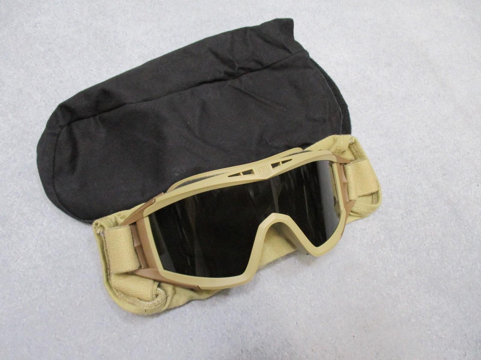 Revision Military Desert Locust goggles with clear lenses and pouch, used but in excellent condition, designed for military protection.