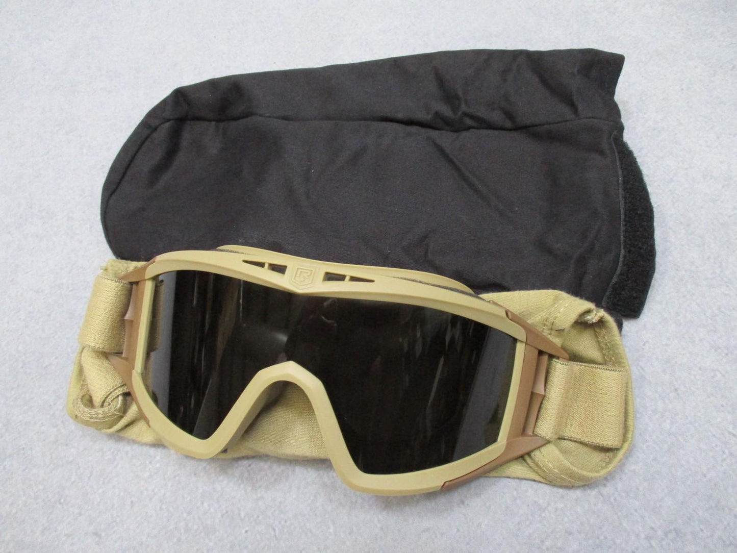 Revision Military Desert Locust goggles with clear lens and pouch, used but in excellent condition, designed for military and tactical use
