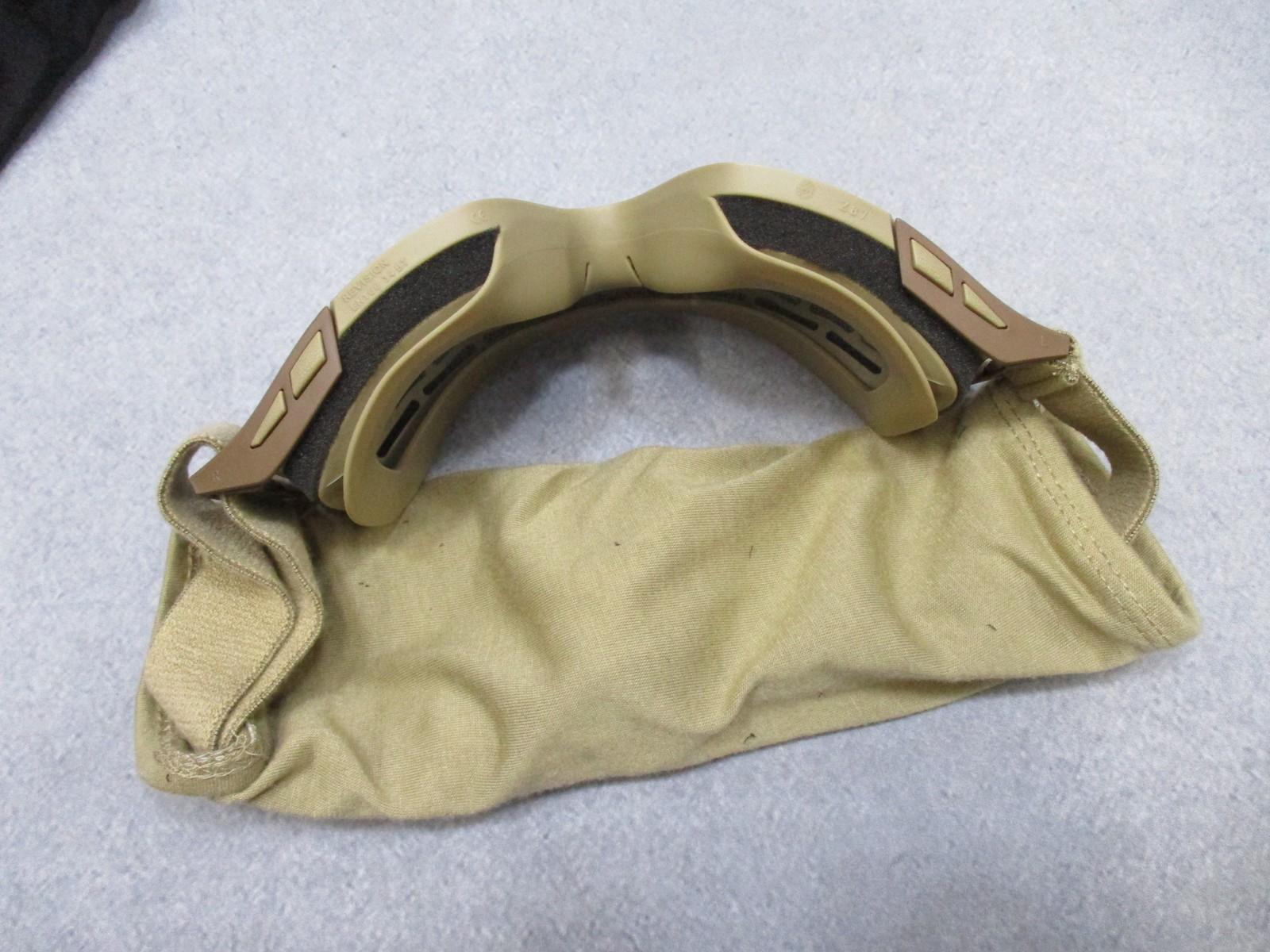 Revision Military Desert Locust goggles with clear lens, adjustable strap, and carrying pouch, used in excellent condition.