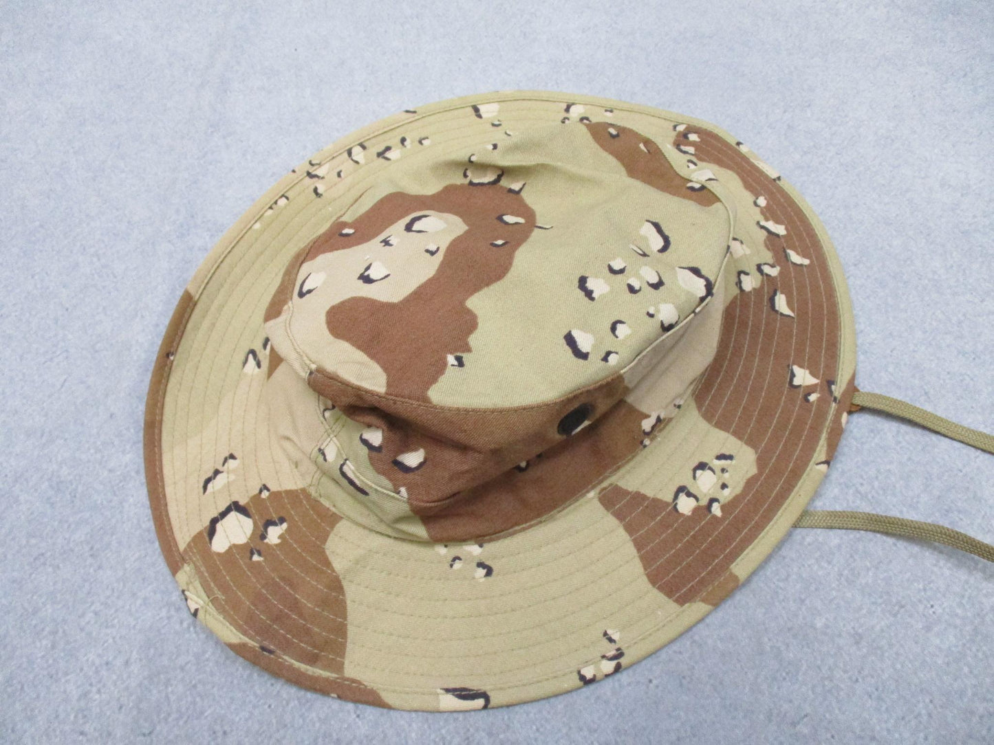 Desert camouflage USGI boonie hat by Centex Military Gear with wide brim in size 7-1/2, featuring chocolate chip pattern.