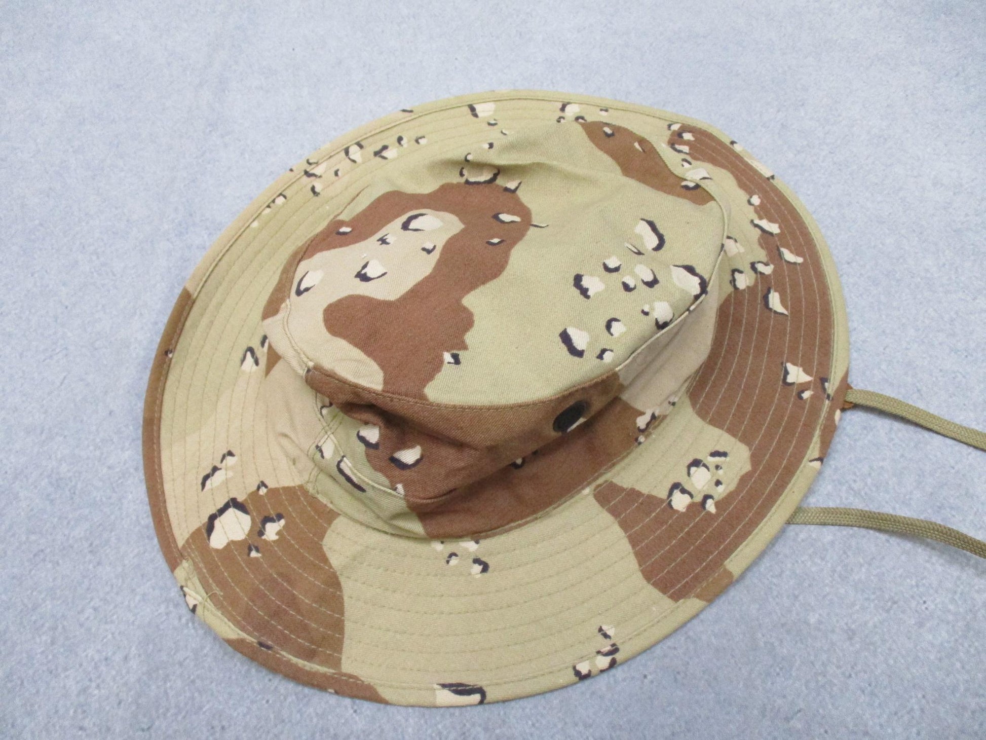 Desert camouflage USGI boonie hat by Centex Military Gear with wide brim in size 7-1/2, featuring chocolate chip pattern.