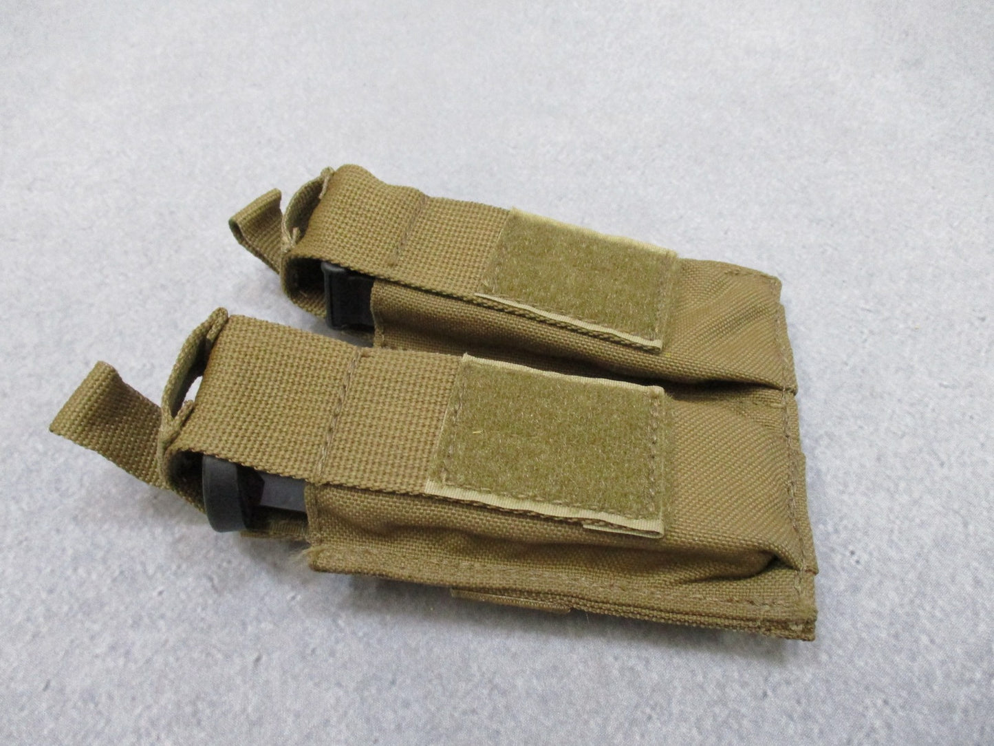 AWS Inc. double pistol magazine pouch by Centex Military Gear, MOLLE coyote, made in USA, used in very good condition.