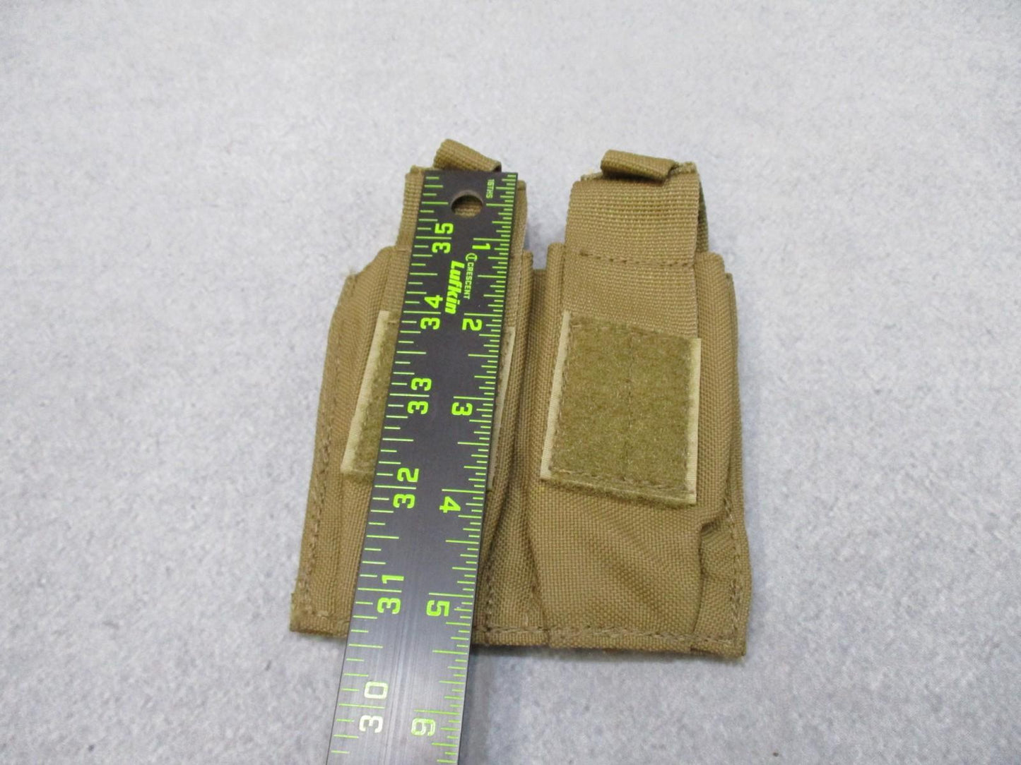 Used AWS Inc. double pistol magazine pouch in coyote with MOLLE attachment by Centex Military Gear, made in USA.