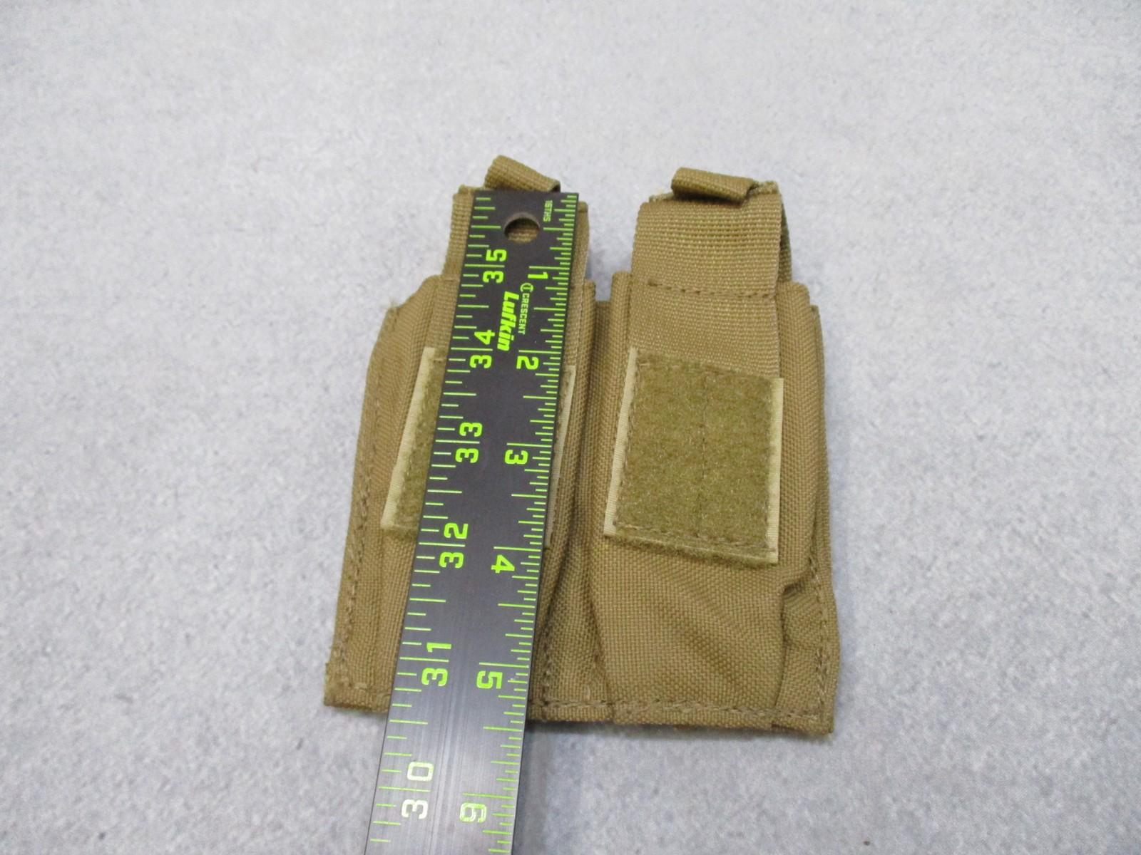 Used AWS Inc. double pistol magazine pouch in coyote with MOLLE attachment by Centex Military Gear, made in USA.