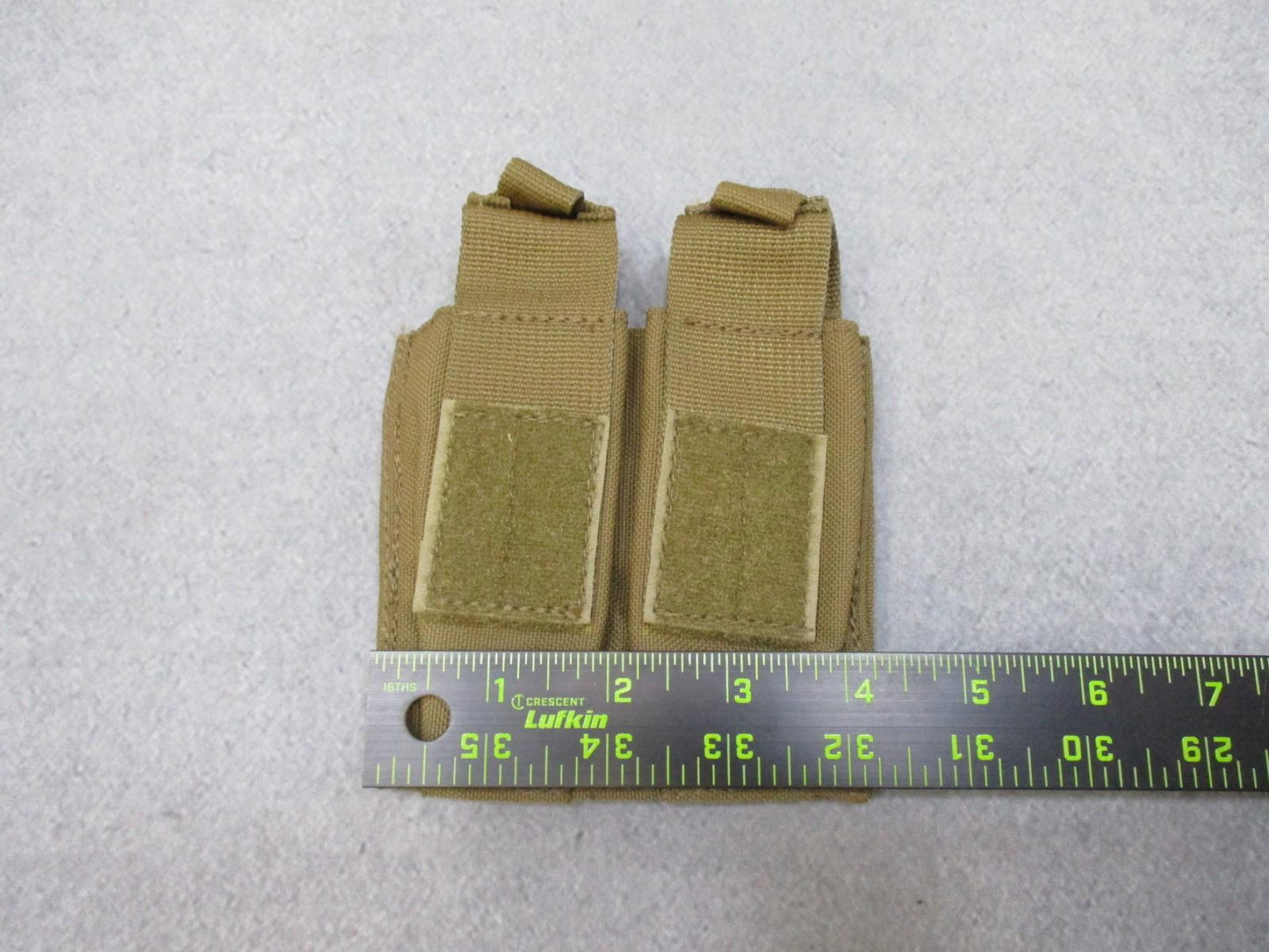 Used AWS Inc. Double pistol magazine pouch by Centex Military Gear, MOLLE coyote nylon, designed for tactical firearm storage.