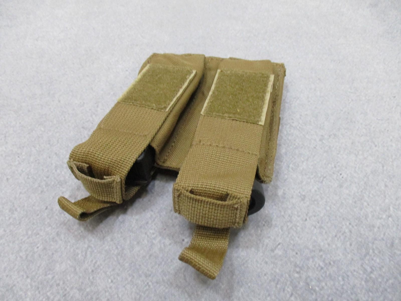 Used AWS Inc. double pistol magazine pouch with MOLLE attachment in coyote color, made in USA, by Centex Military Gear.