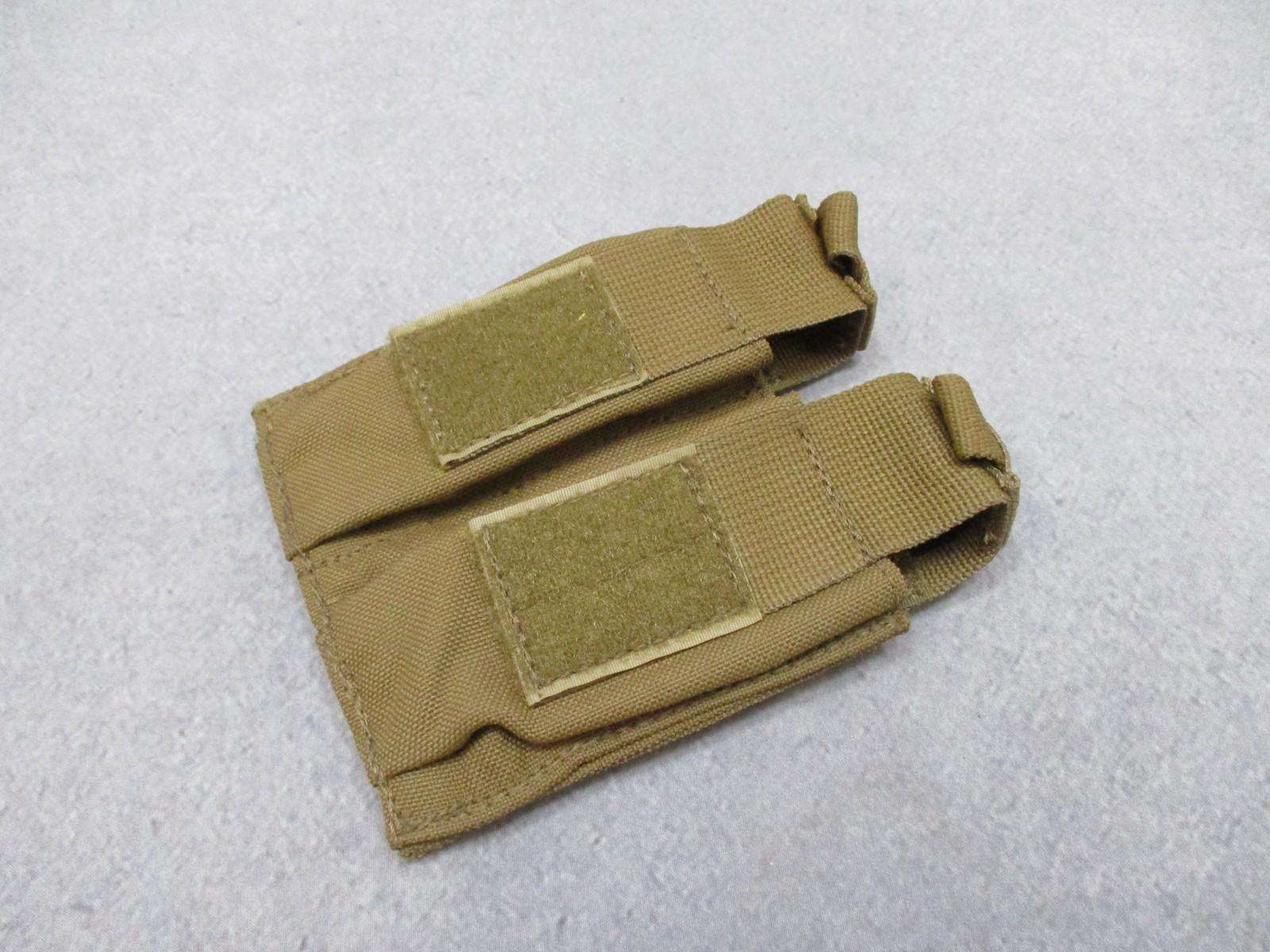 Used AWS Inc. double pistol magazine pouch by Centex Military Gear with MOLLE attachment in coyote color, made in the USA.