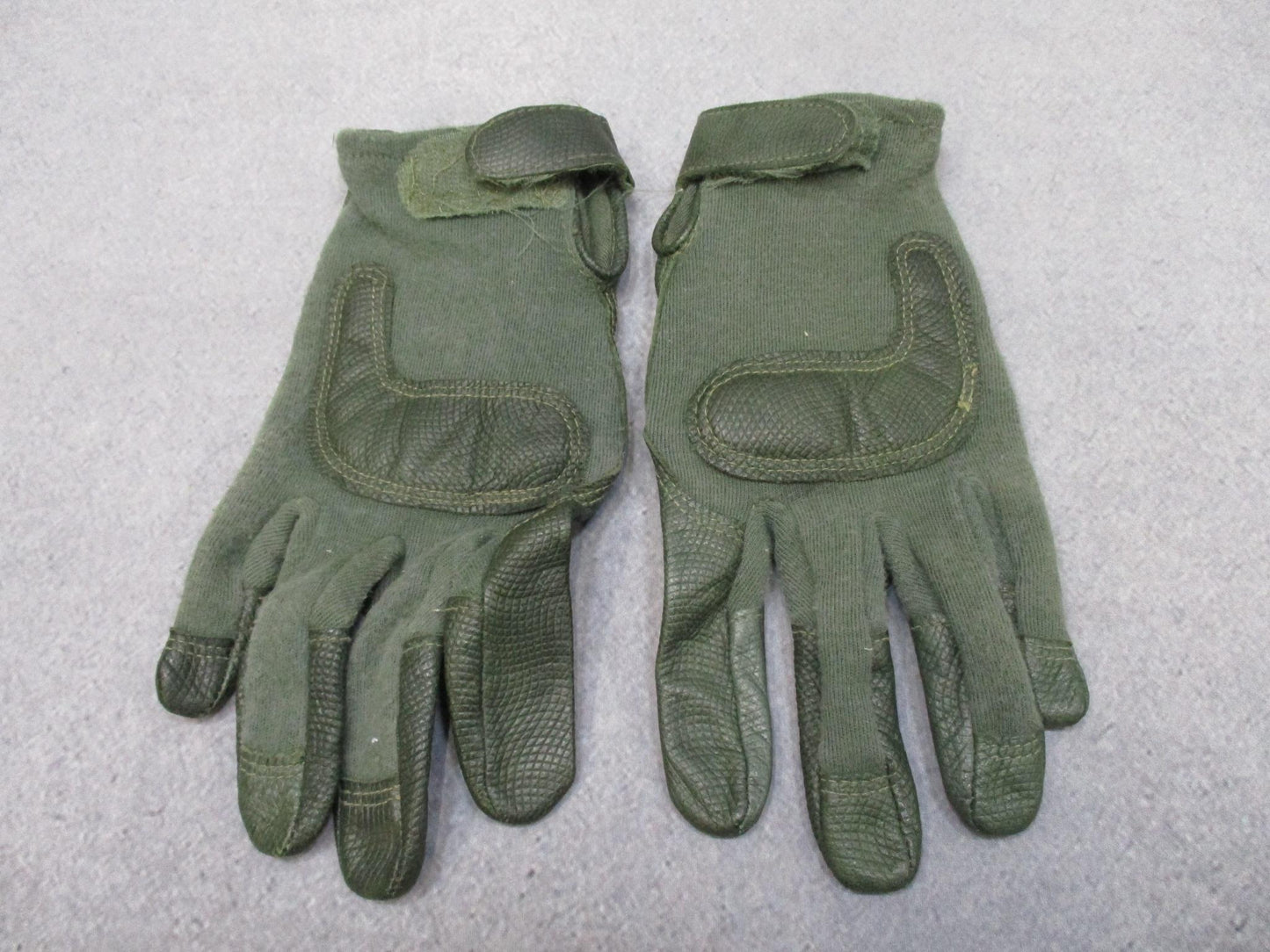 Green goatskin leather tactical combat gloves in medium size, designed for military and duty use, with reinforced stitching.