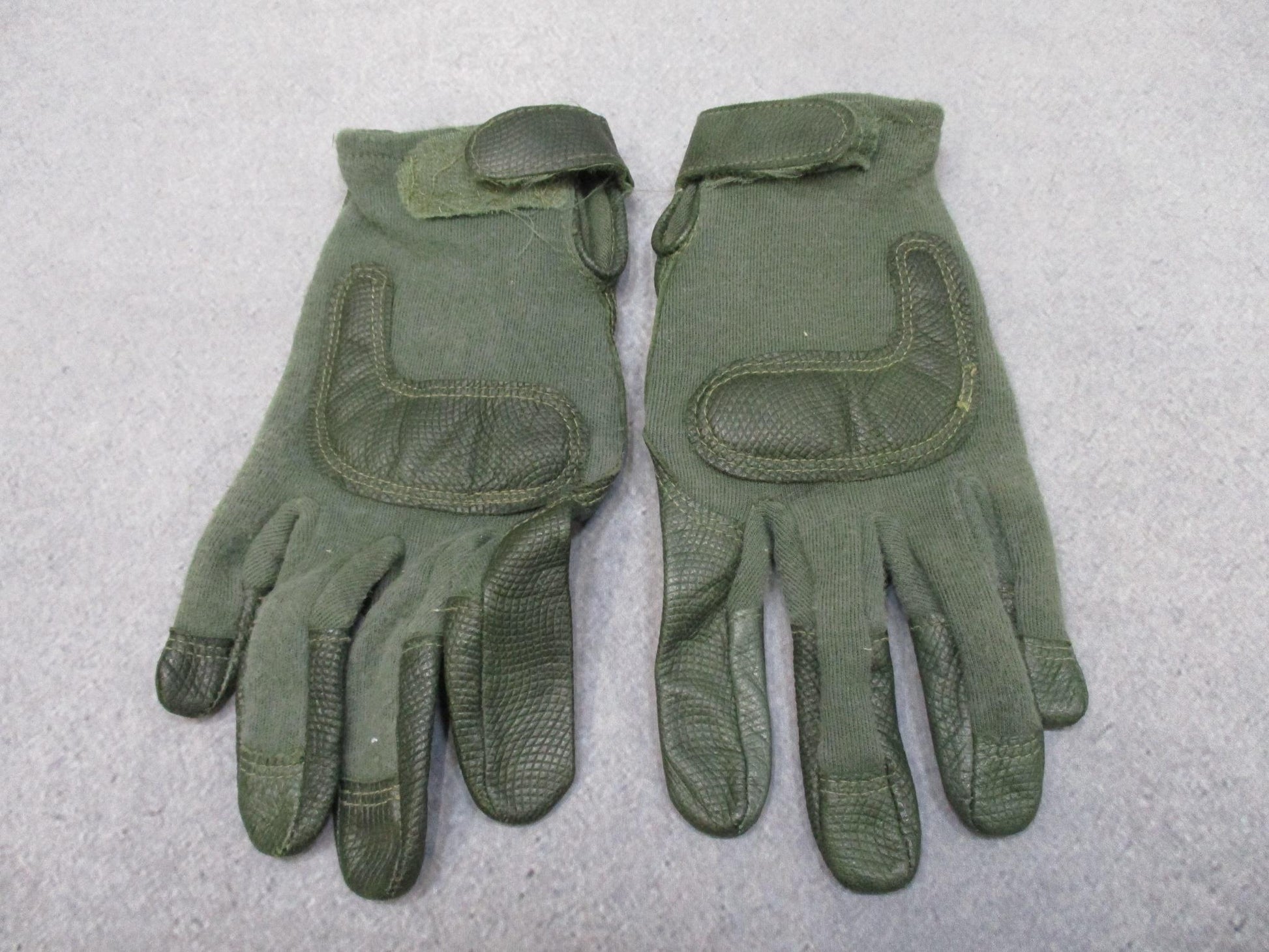 Green goatskin leather tactical combat gloves in medium size, designed for military and duty use, with reinforced stitching.