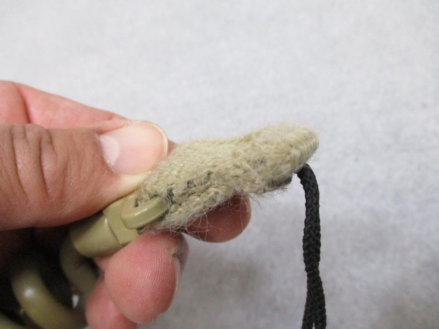 Tan Gem-Tech pistol lanyard dummy cord by Centex Military Gear with coiled design for tactical duty use