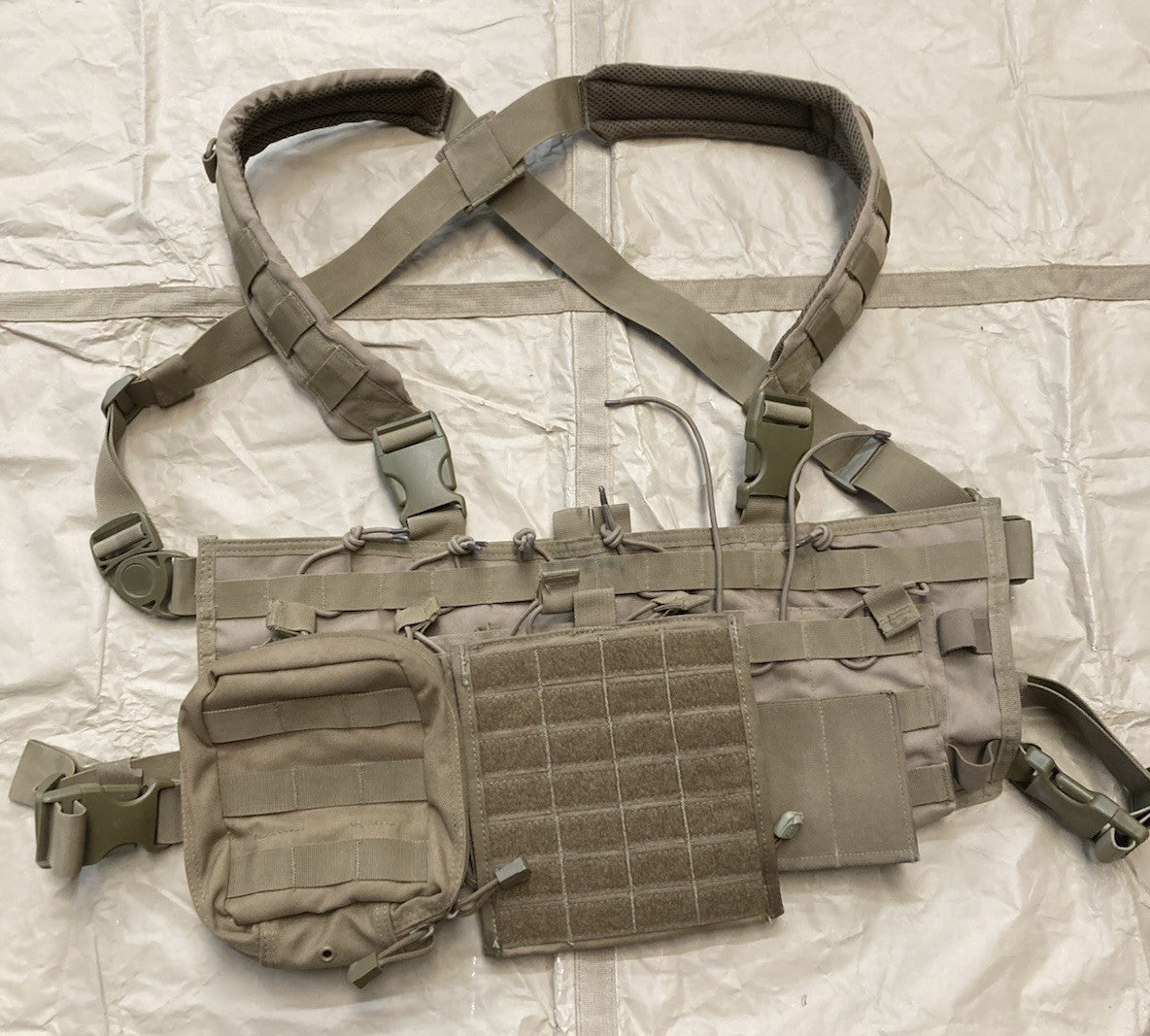 Centex Military Gear Condor tactical chest rig in coyote brown with molle gear set and missing pull tab, designed for military use.