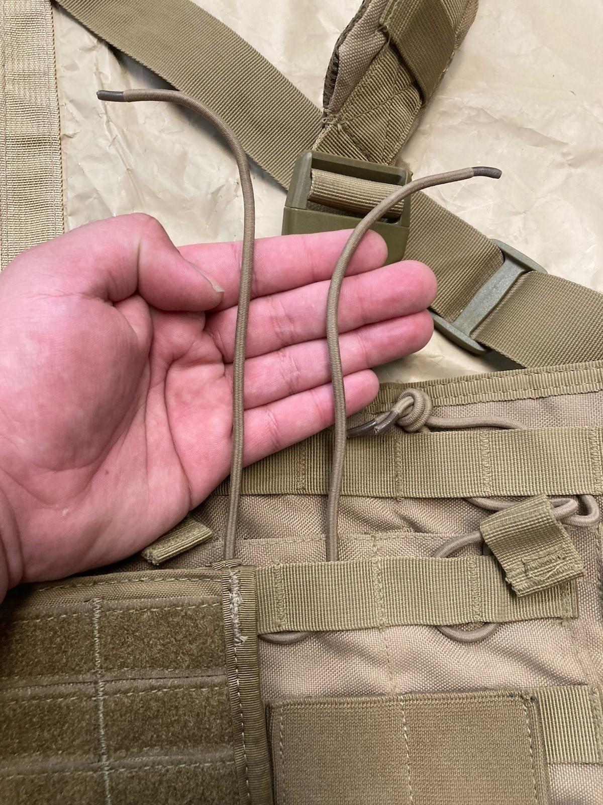 Centex Military Gear Condor chest rig in coyote brown with MOLLE gear setup and missing pull tab, tactical military-style load-bearing vest