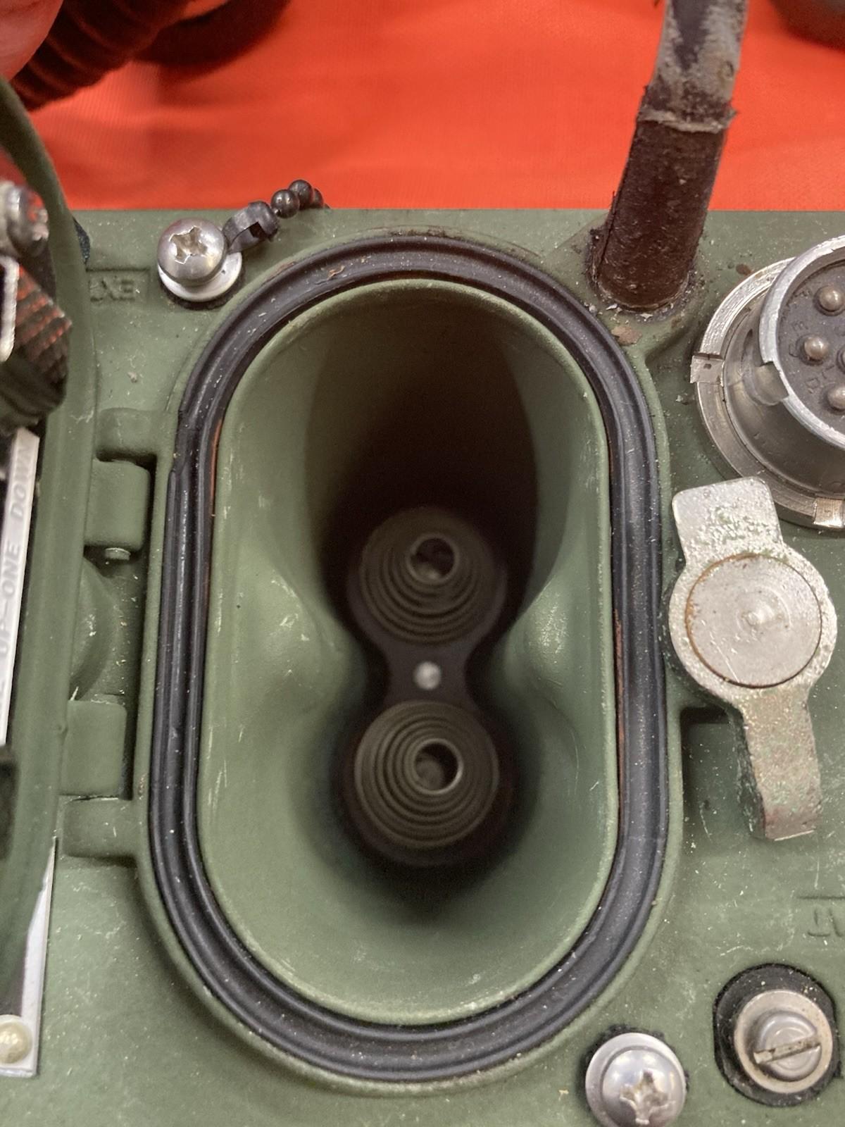 Vietnam War USGI field phone military commo telephone with rugged design, used by soldiers for secure communication.