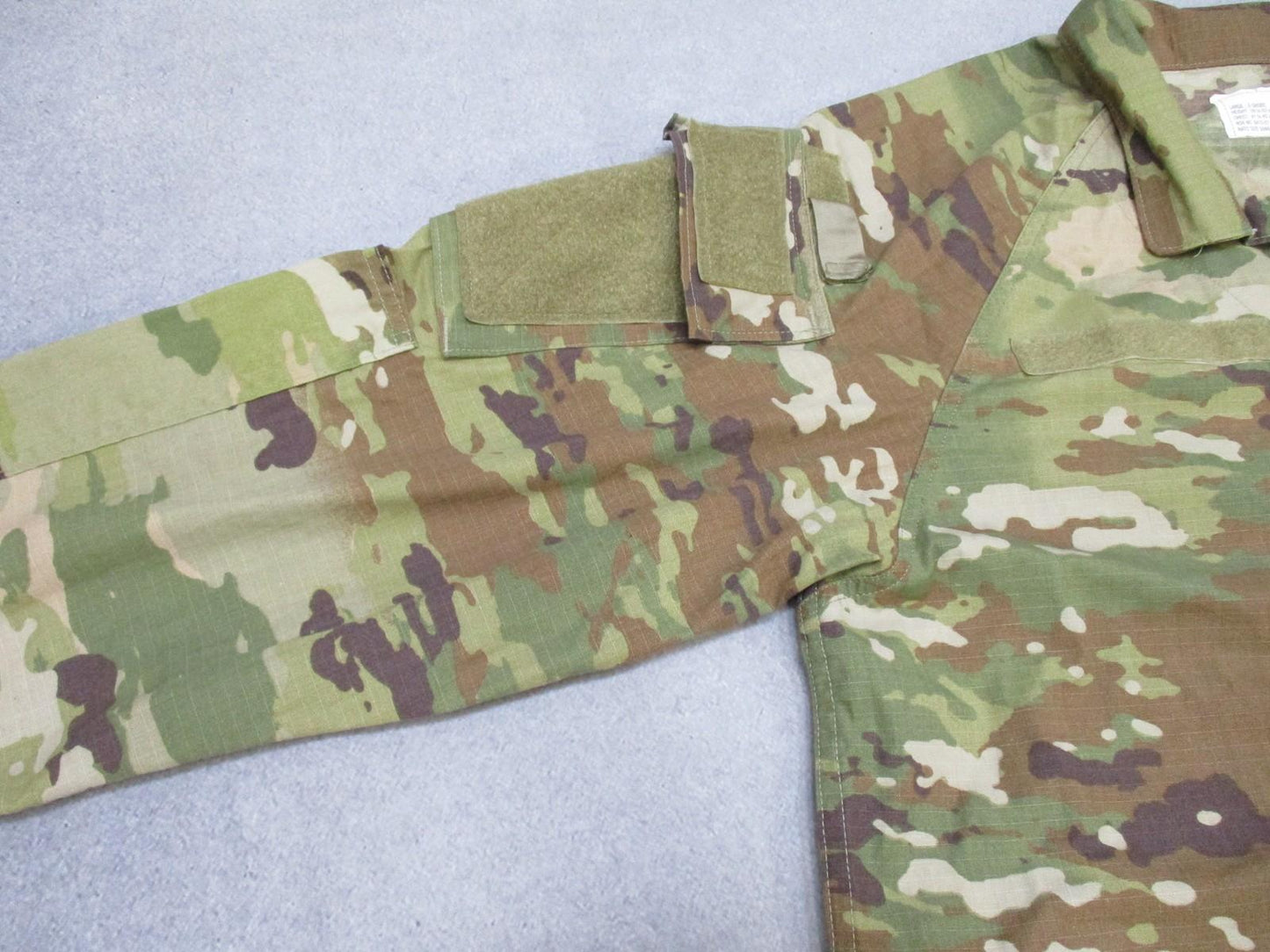 US Military Improved Hot Weather Combat Uniform Jacket in MultiCam with large X-short size by Centex Military Gear.