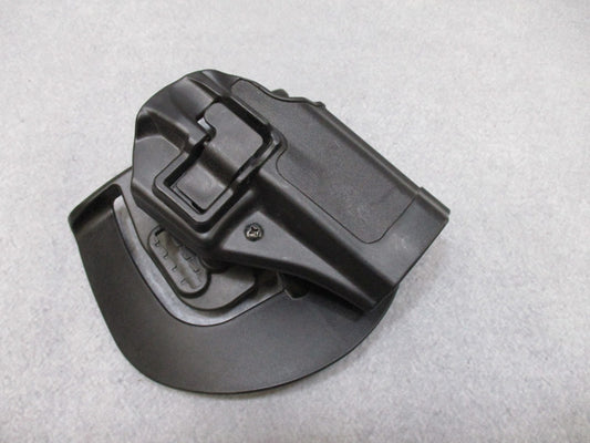 Blackhawk CQC SERPA holster in black for S&W M&P Sigma 9/40, right hand, with retention system, shown in image.