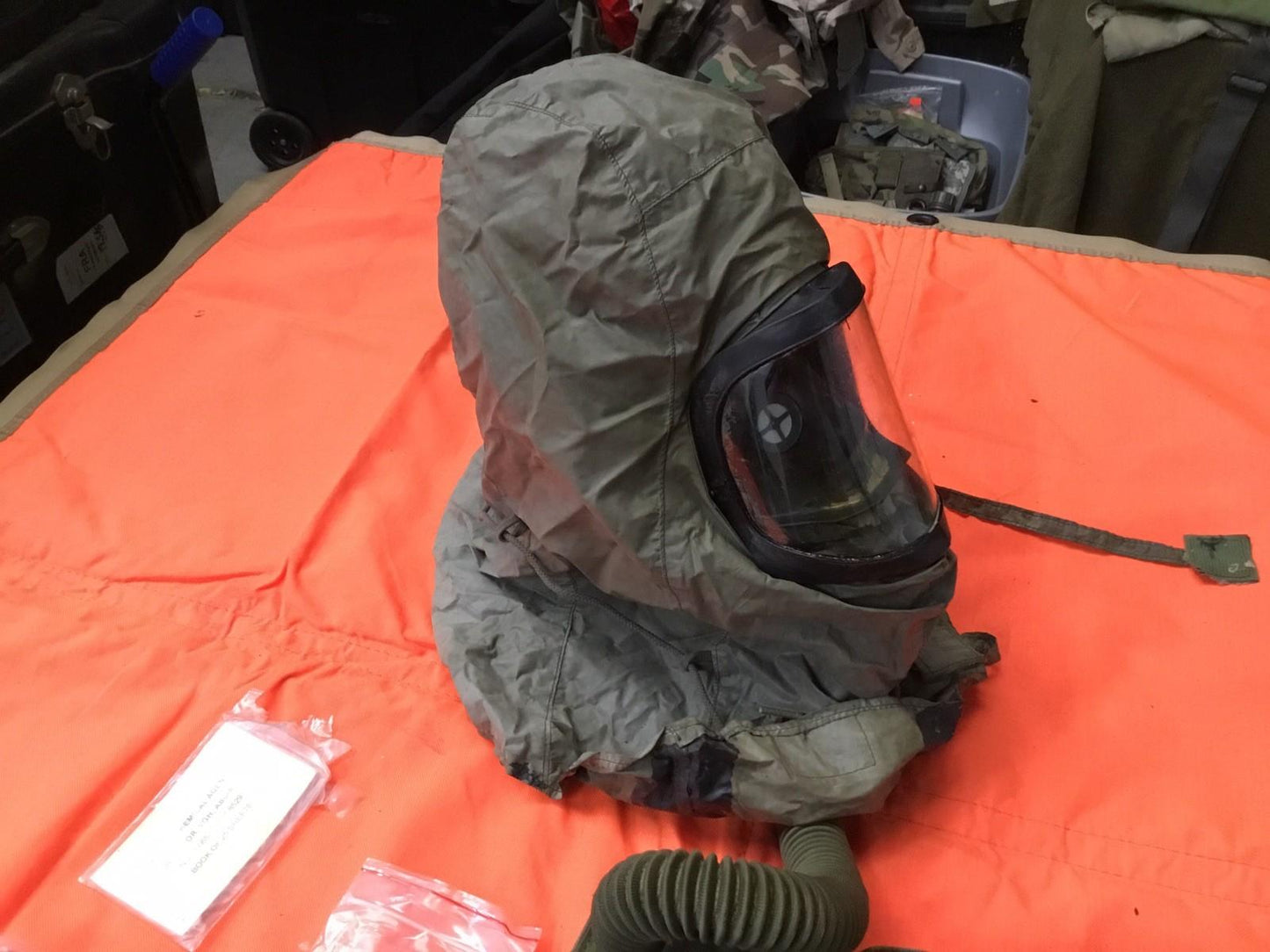 Small size Usgi M25A1 pilot gas mask by Centex Military Gear, featuring adjustable straps and clear eye lenses for aviation safety.