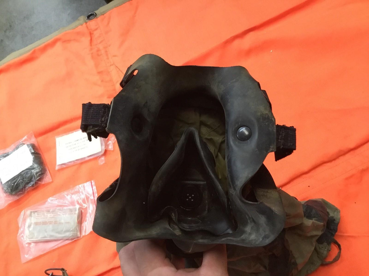 Small size Usgi M25A1 pilot gas mask by Centex Military Gear with adjustable straps and clear eye lenses.