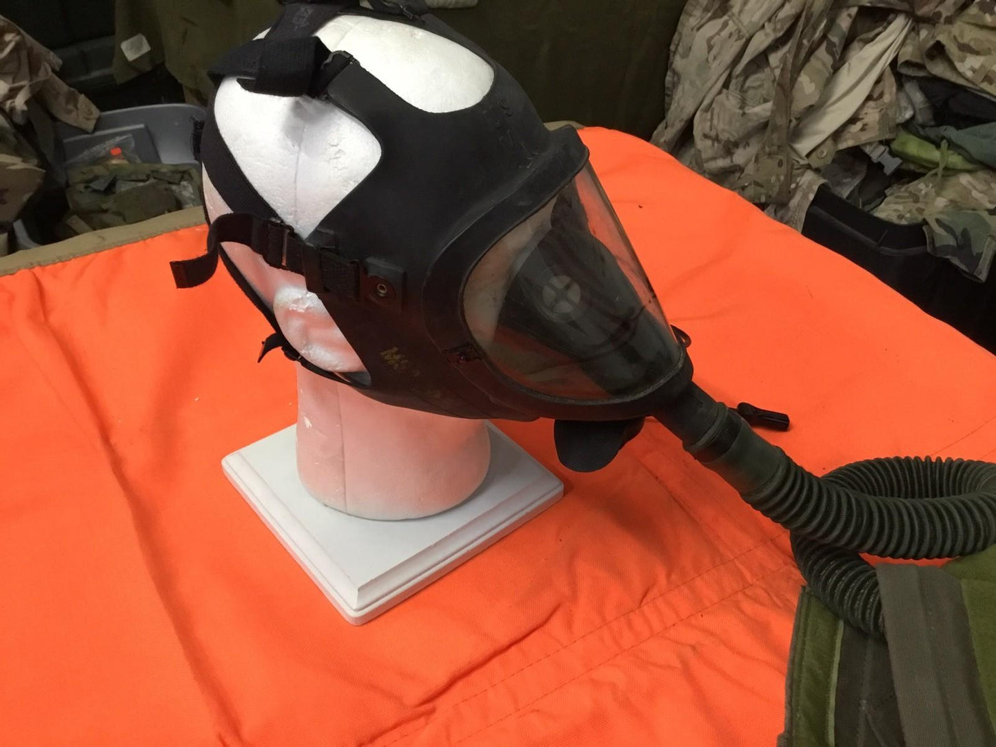 Vintage U.S. military M25A1 gas mask with storage bag, medium size, collectible surplus from Centex Military Gear.