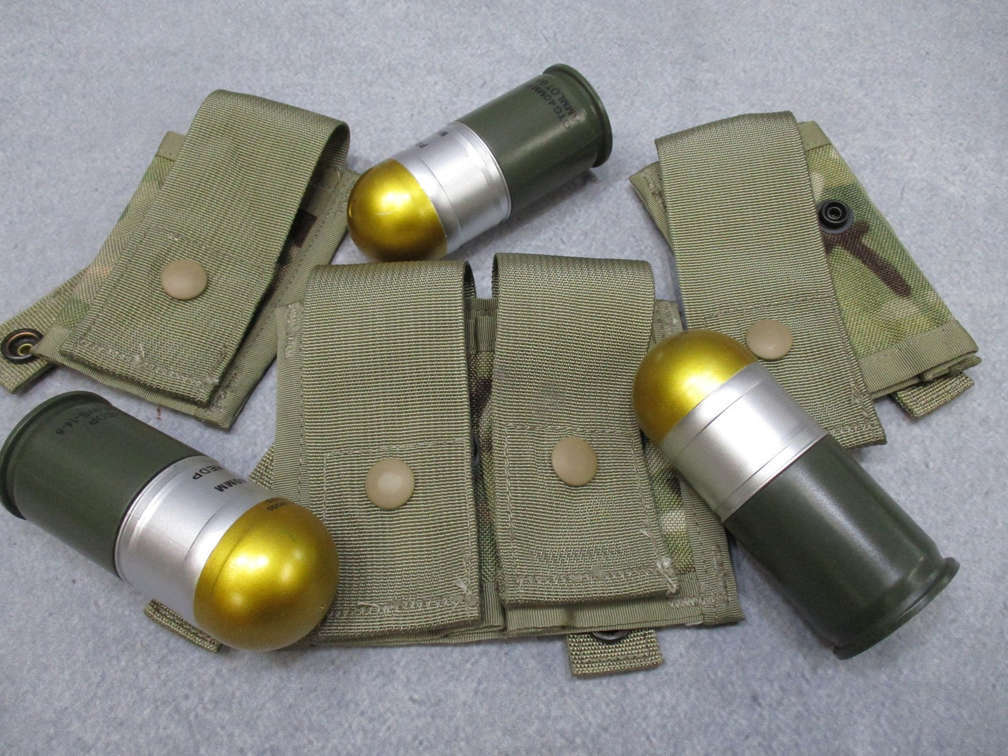 Centex Military Gear USGI MOLLE II 40mm grenade pouch set in Multicam, with one double and two single pouches for tactical gear.