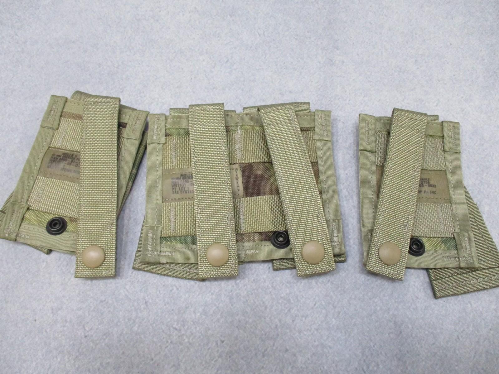 USGI MOLLE II 40mm grenade pouch set in Multicam, includes one double and two single pouches for military gear.