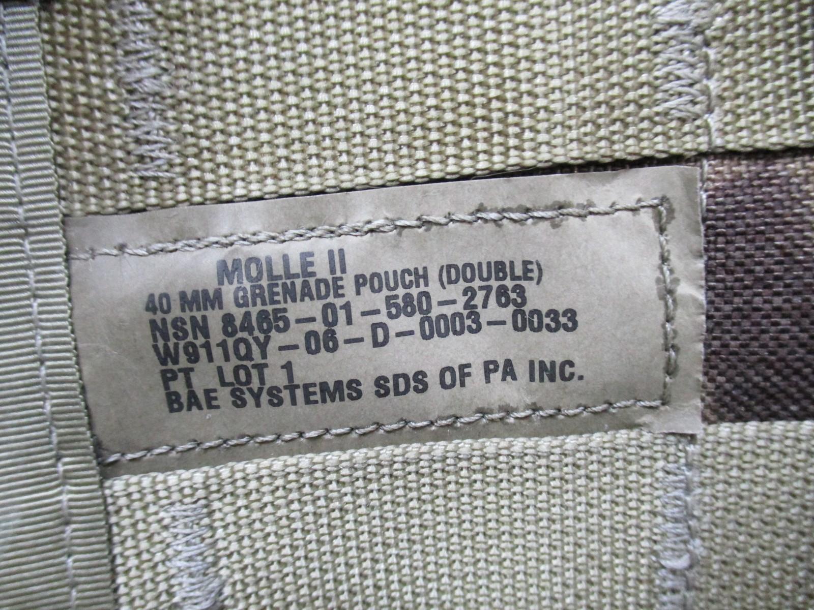 USGI MOLLE II 40mm grenade pouch set in Multicam with one double and two single pouches, designed for military gear.