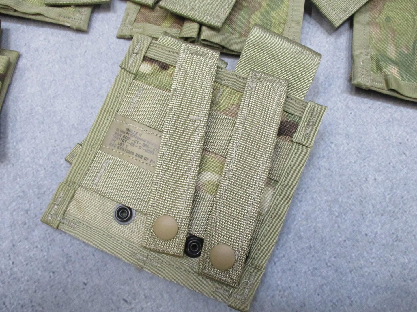 Double MultiCam MOLLE II 40mm Pyrotechnic Pouch from Centex Military Gear showing tactical pouch with MOLLE webbing and secure closures.
