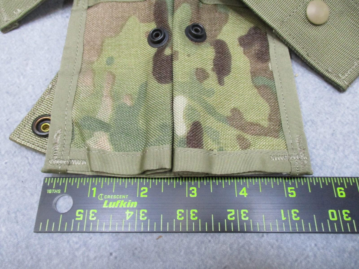 Double MultiCam MOLLE II 40mm Pyrotechnic Pouch by Centex Military Gear, shown attached to tactical military gear.