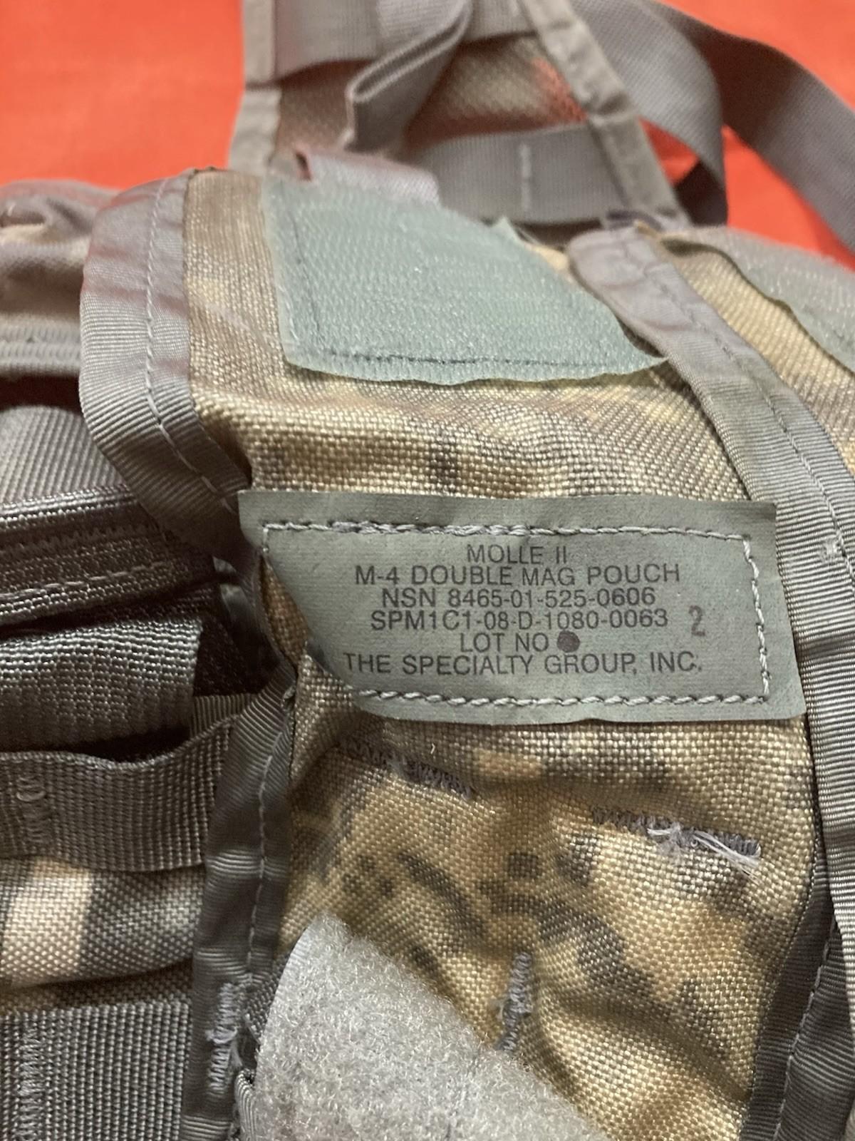 Army Issue Riflemen Set with ACU FLC vest and tactical MOLLE gear, featuring military-style camouflage and tactical pouches.