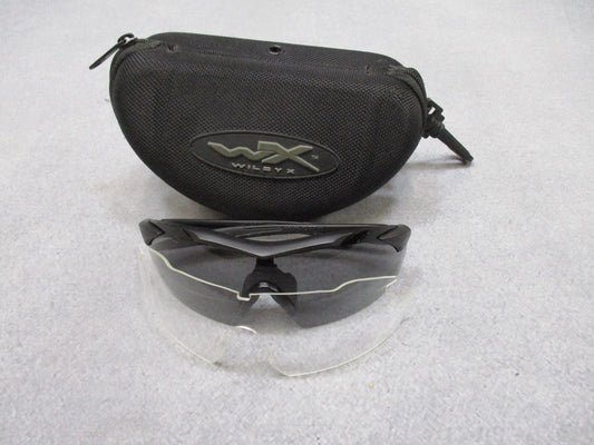 Wiley X Vapor sunglasses with interchangeable lenses and case, featuring wraparound design and black frame, used condition.