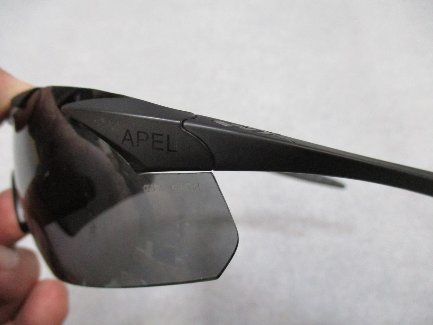 Used Wiley X Vapor sunglasses with interchangeable lenses and case, featuring durable frame and protective Z87+ safety rating.