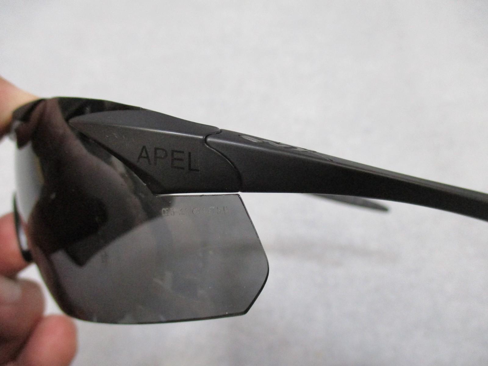Used Wiley X Vapor sunglasses with interchangeable lenses and case, featuring durable frame and protective Z87+ safety rating.