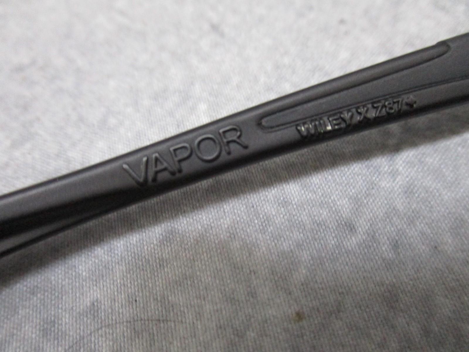 Wiley X Vapor sunglasses with interchangeable lenses, black frame, and case, used, featuring Z87+ impact protection.