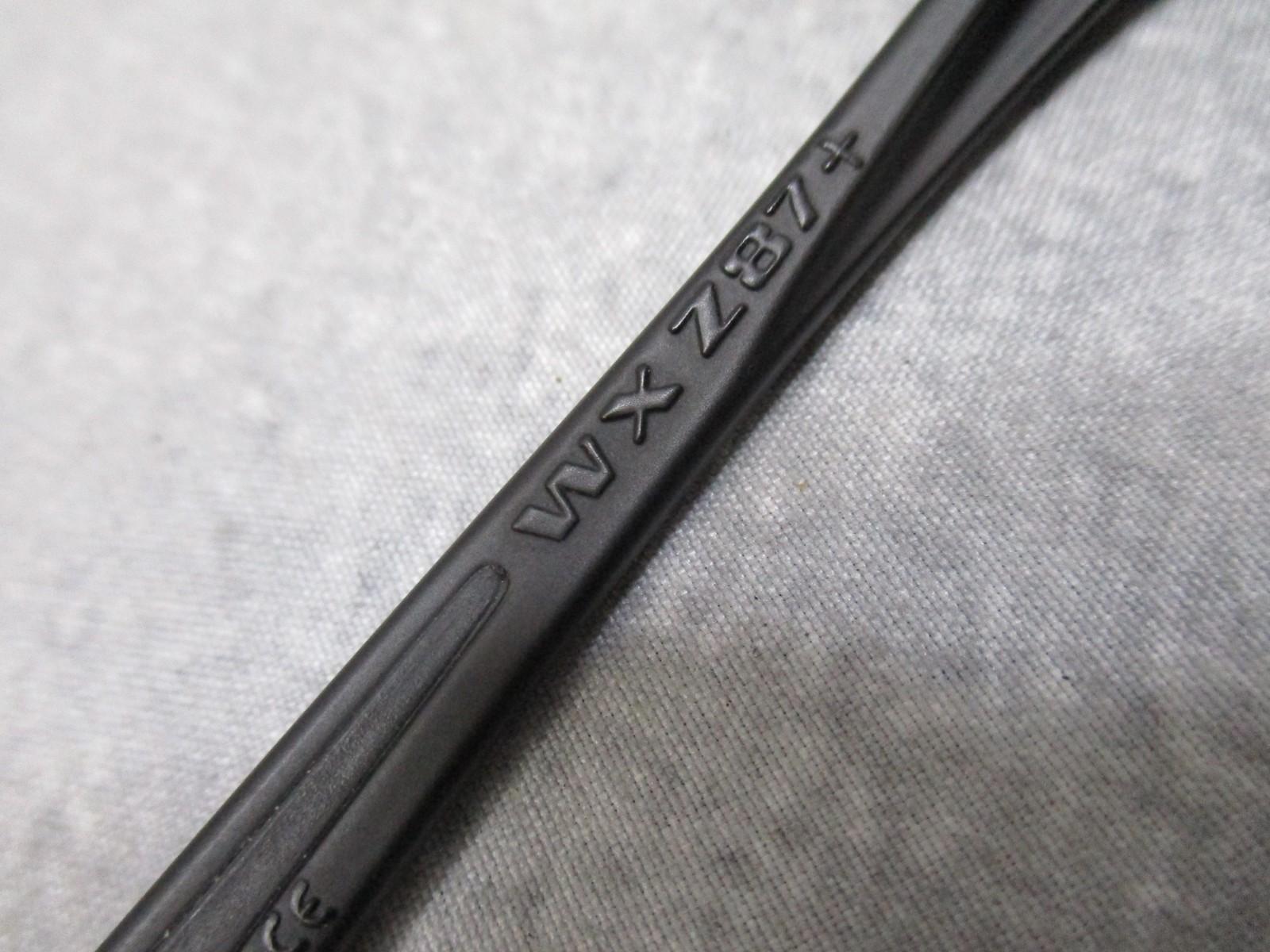 Wiley X Vapor sunglasses with interchangeable lenses, black frame, and case, used condition, featuring Z87+ impact protection.