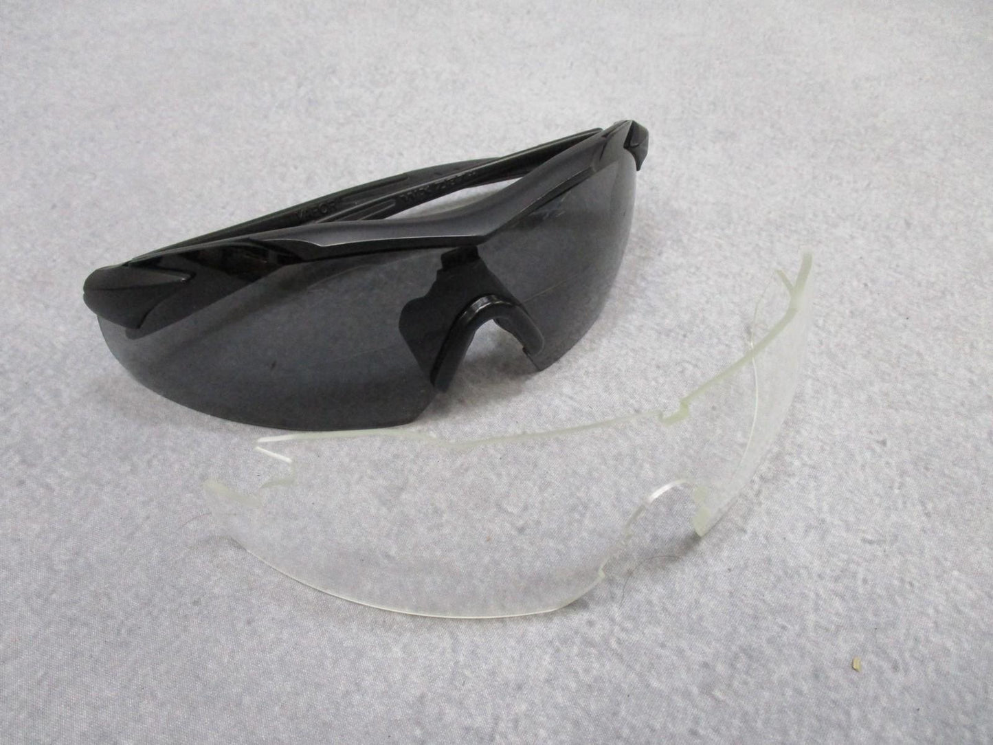 Wiley X Vapor sunglasses with interchangeable lenses and case, featuring a durable frame and sleek design for outdoor activities.