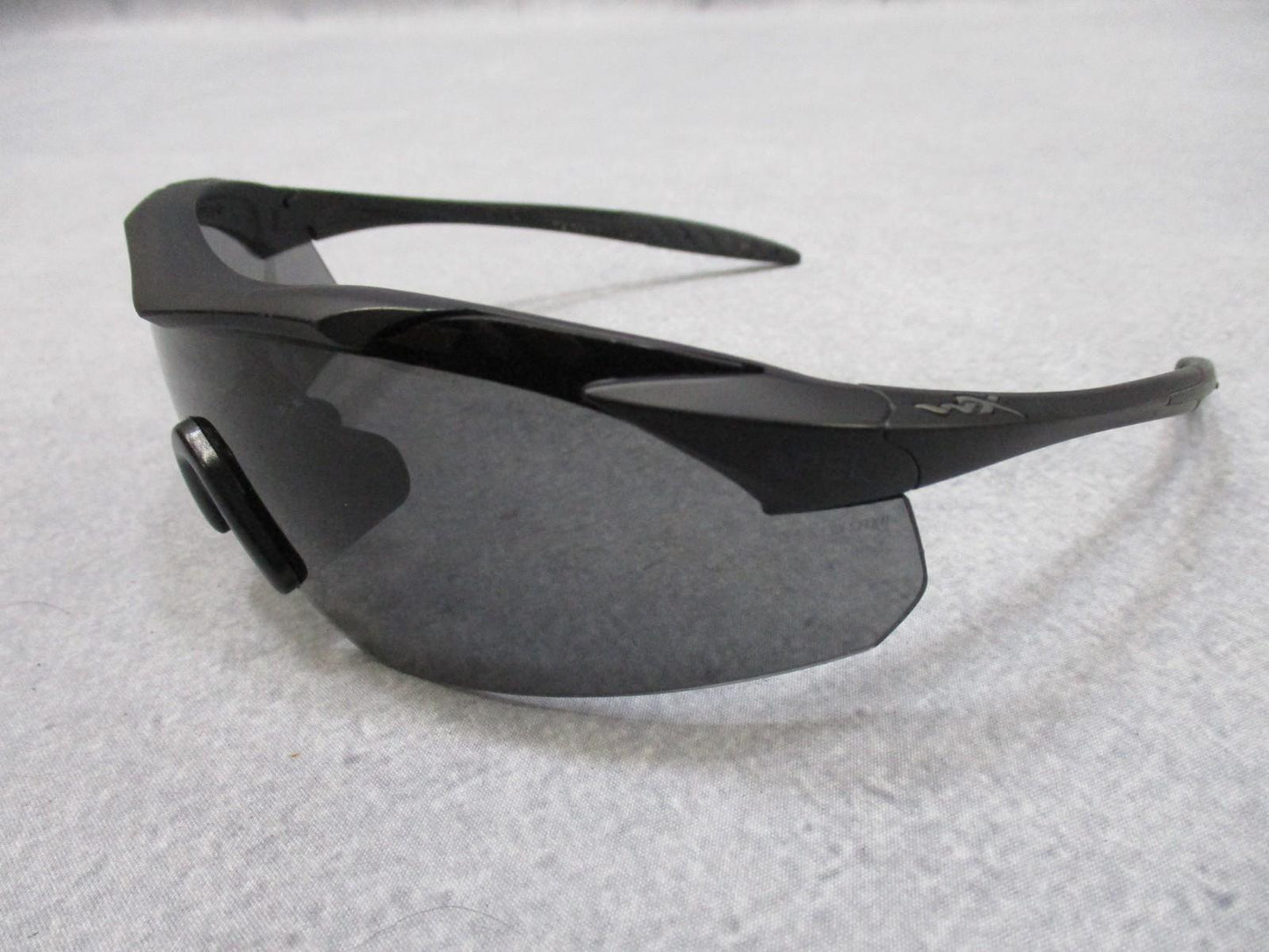 Used Wiley X Vapor sunglasses with interchangeable lenses by Centex Military Gear, shown with case and multiple lens options.