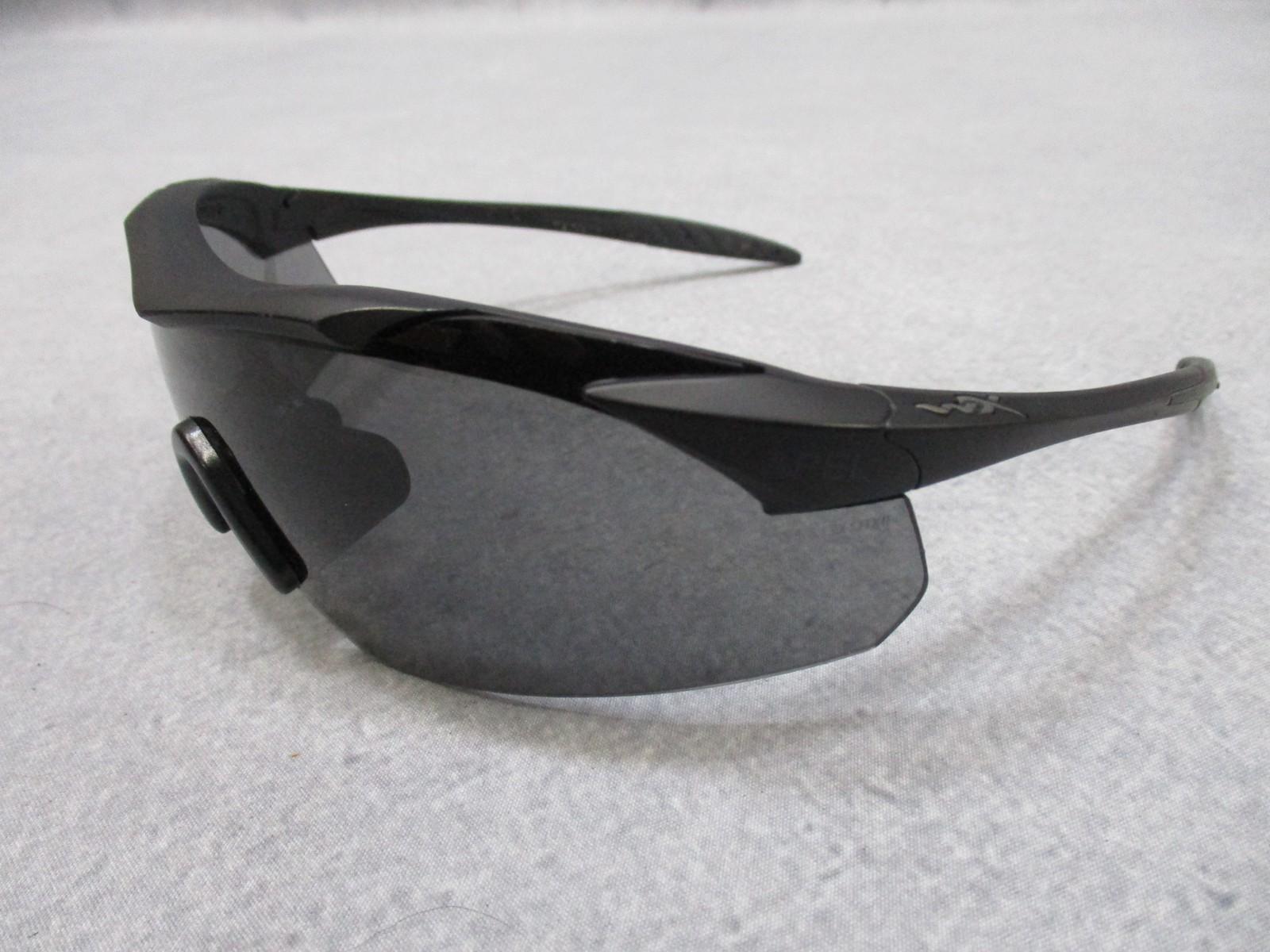 Used Wiley X Vapor sunglasses with interchangeable lenses by Centex Military Gear, shown with case and multiple lens options.