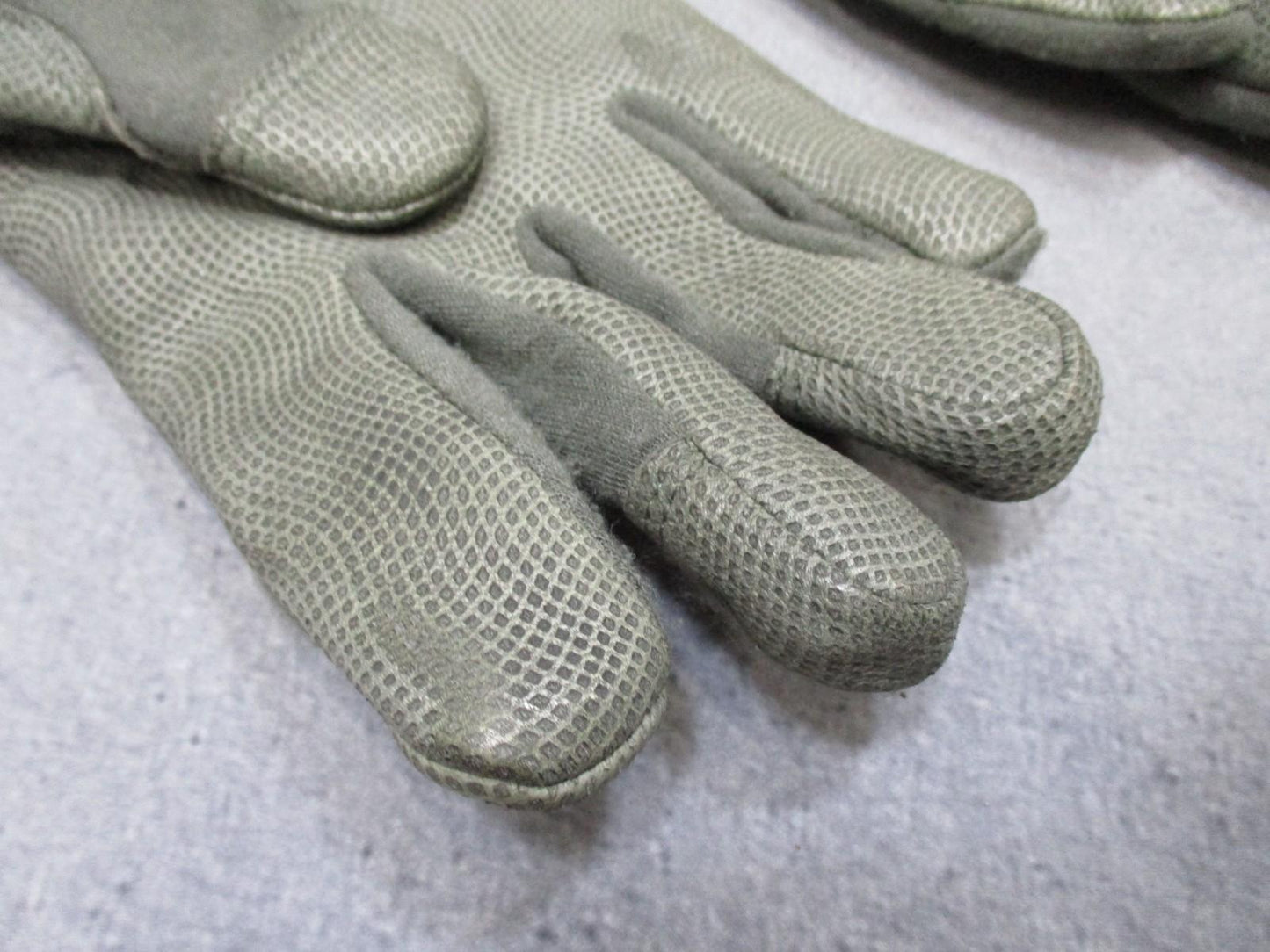 USGI Masley Glove HANDLOGIC 75W GORE-TEX Nomex goatskin gloves in X-Large, showing durable protective design, black color, and reinforced fingertips.