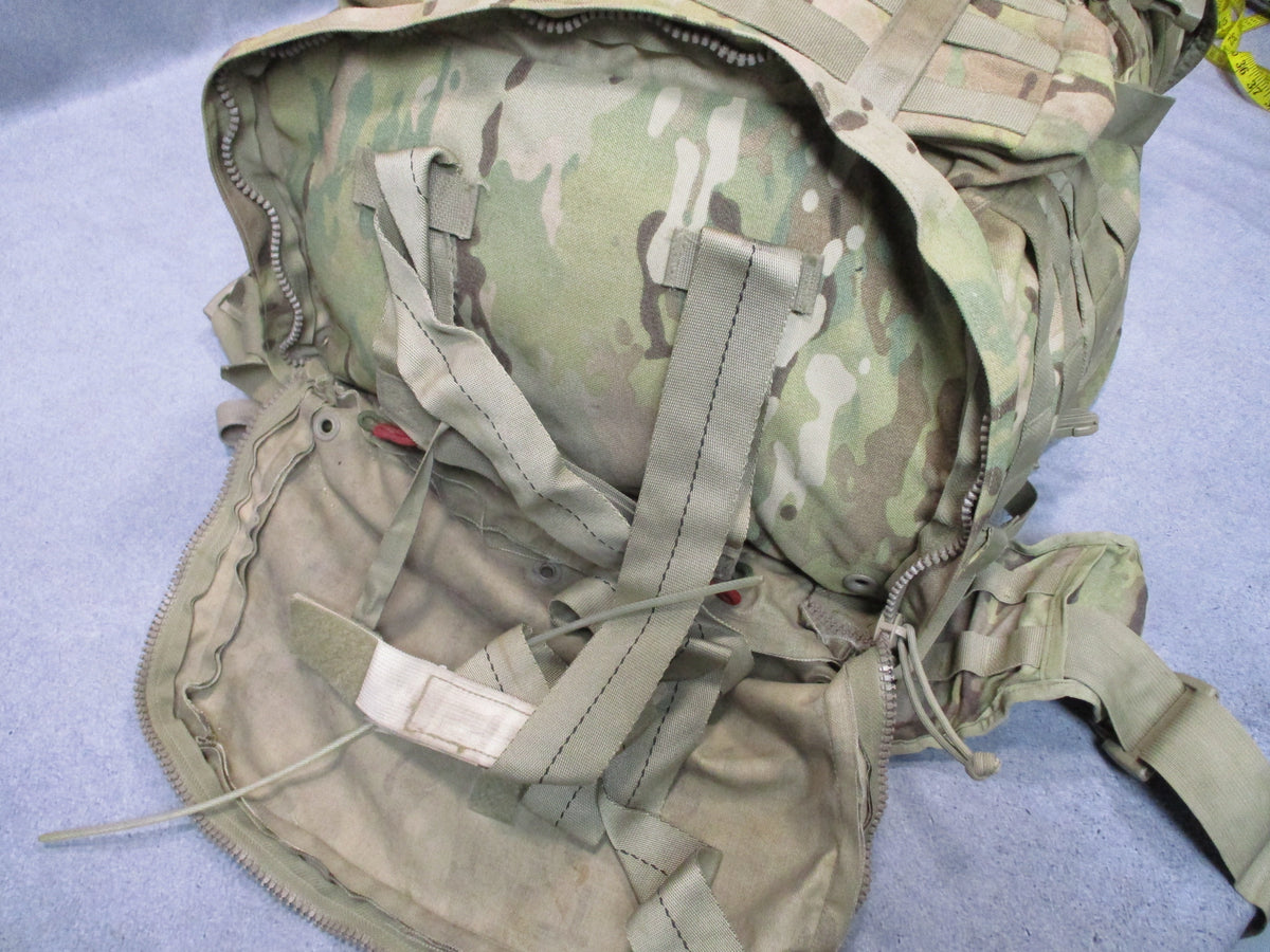 MOLLE 4000 Airborne Test Item rucksack camo pack with cracked frame, used fair condition