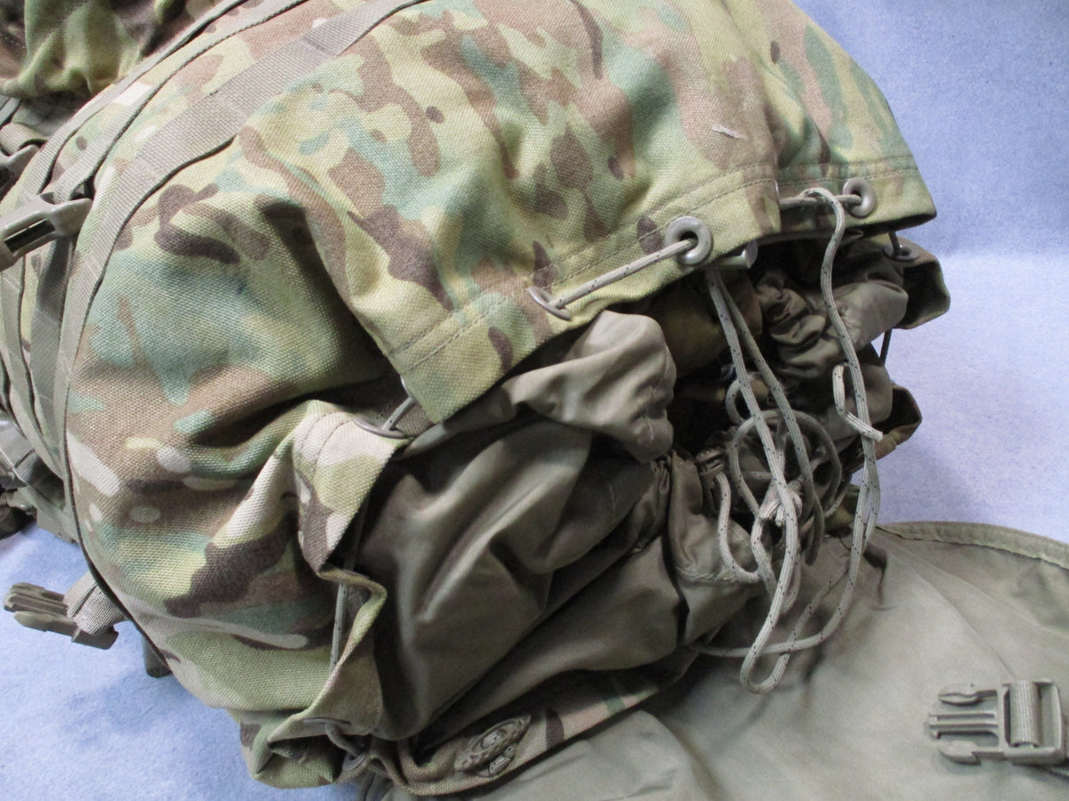 MOLLE 4000 Airborne Test Item rucksack camo pack with cracked frame, used condition