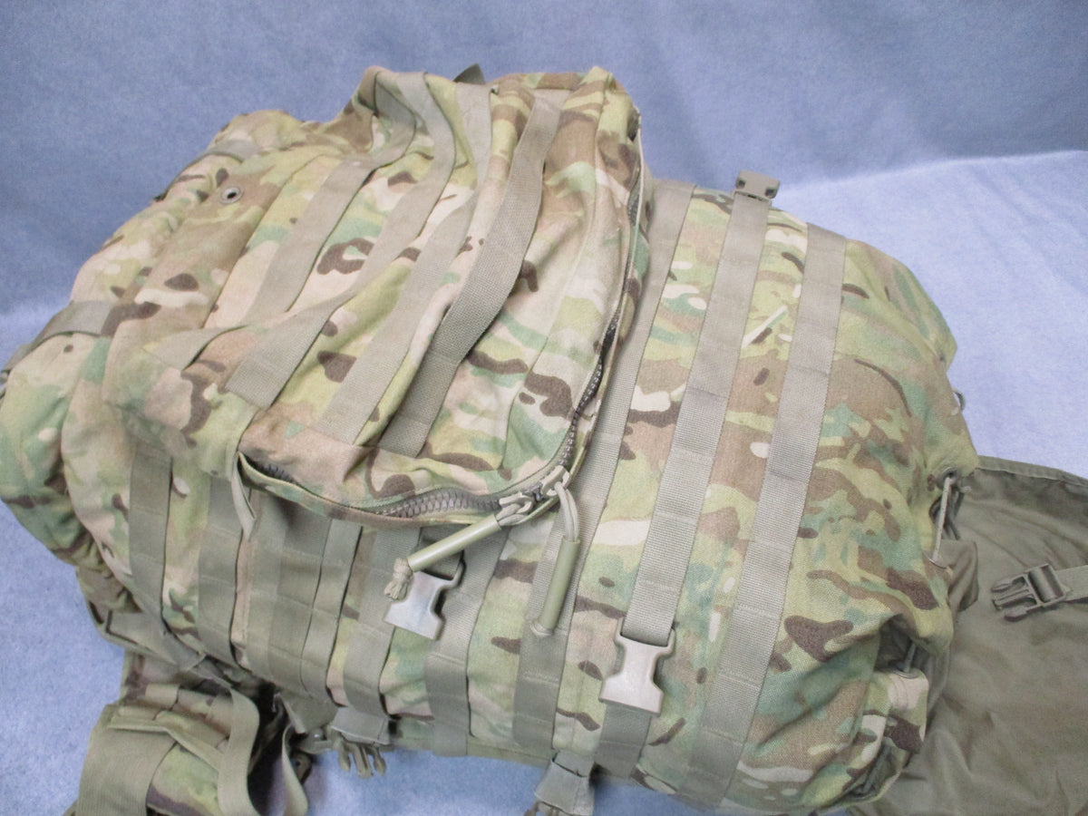 MOLLE 4000 Airborne Test Item rucksack in camouflage with cracked frame and used fair condition