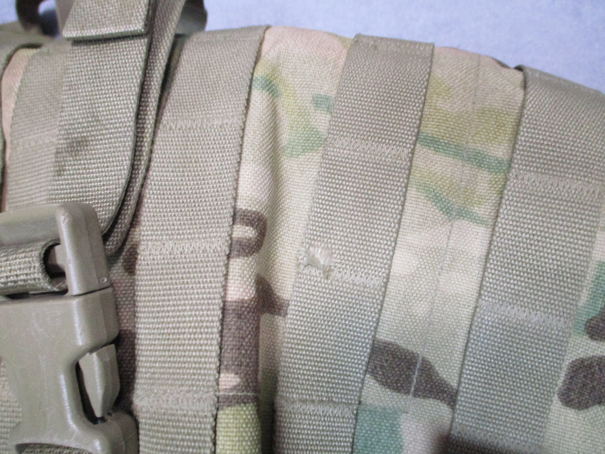 MOLLE 4000 Airborne test item rucksack in OCP camouflage with cracked frame and worn condition