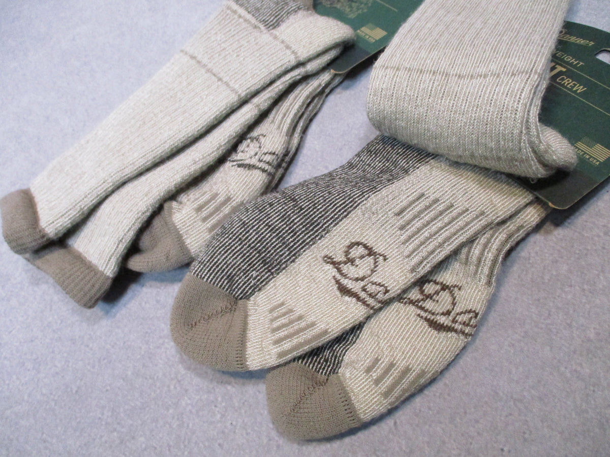 Two pairs of Danner Midweight Hunt Crew Merino Wool Socks in XL, USA-made crew socks on white background