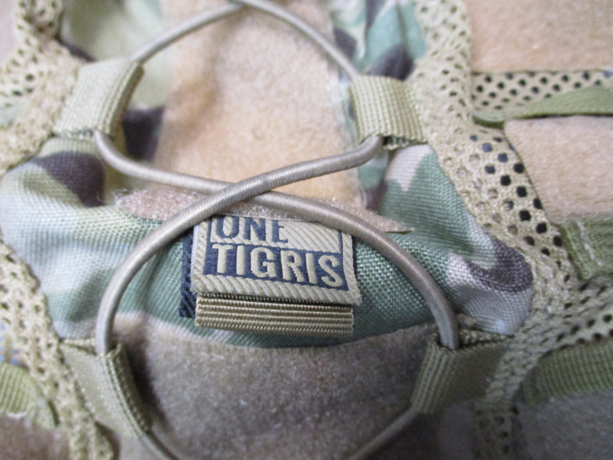 OneTigris tactical helmet cover in Multicam OCP style with mesh and bungee, designed for military or outdoor helmets.