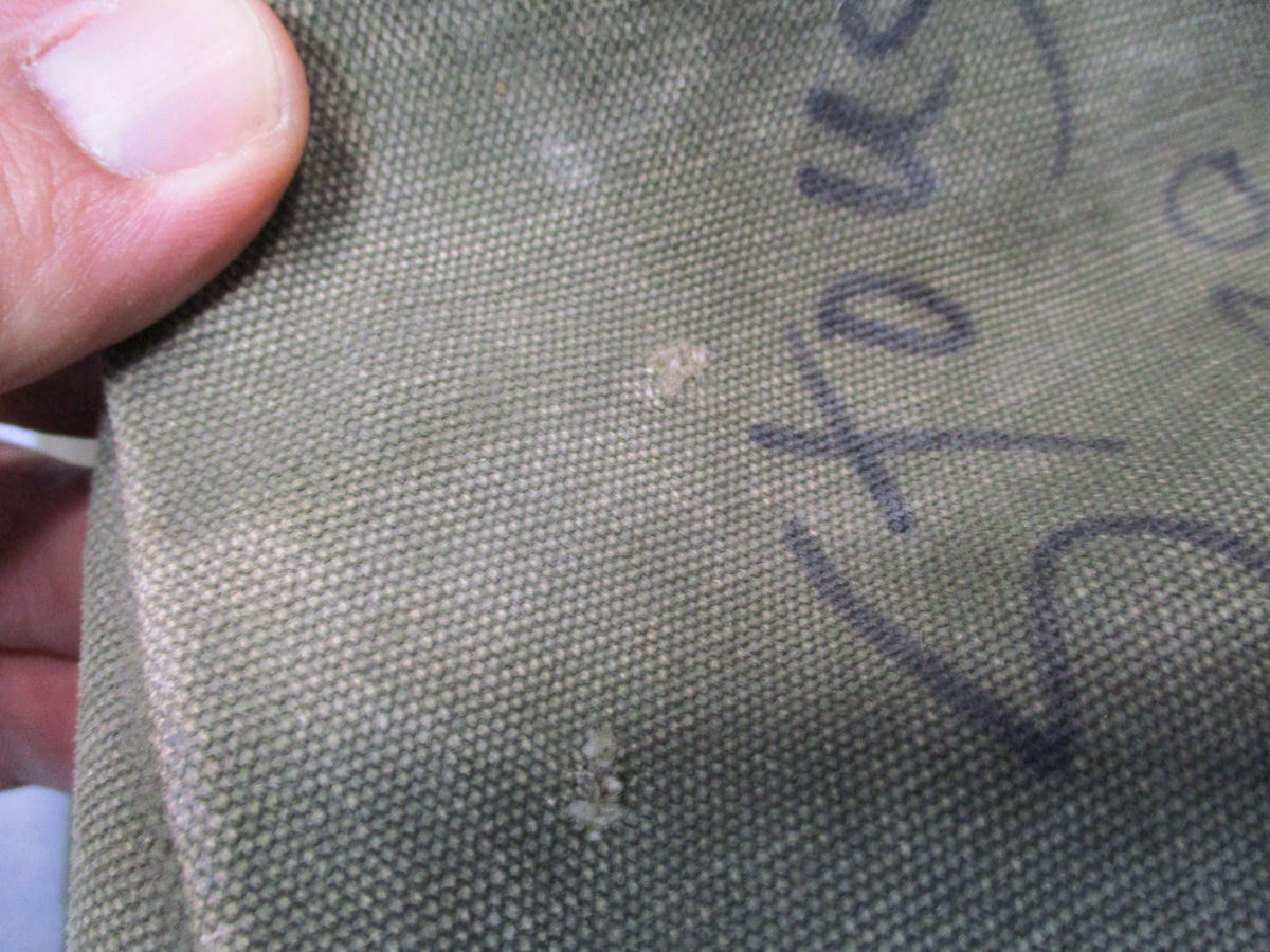 USGI 1980s OD green cotton canvas duffel sea bag with shoulder straps, military surplus used, rugged and durable.